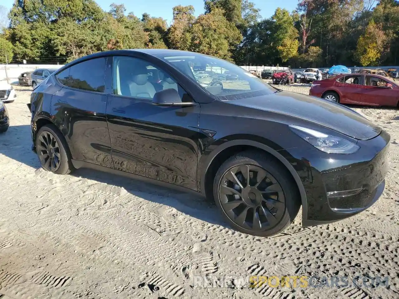 4 Photograph of a damaged car 7SAYGAEE3PF915156 TESLA MODEL Y 2023