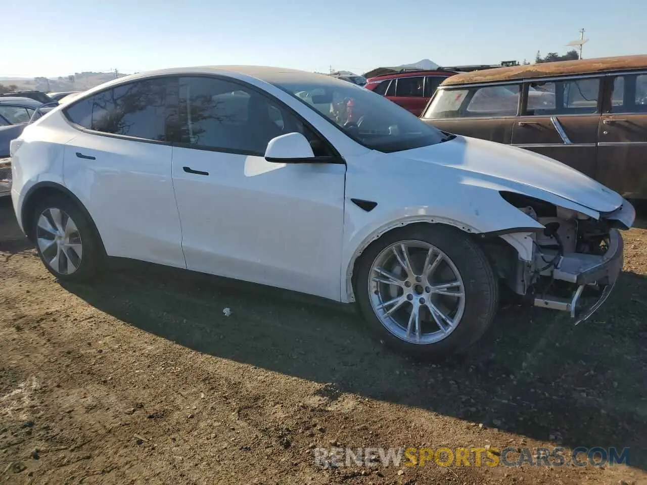 4 Photograph of a damaged car 7SAYGAEE3PF970884 TESLA MODEL Y 2023