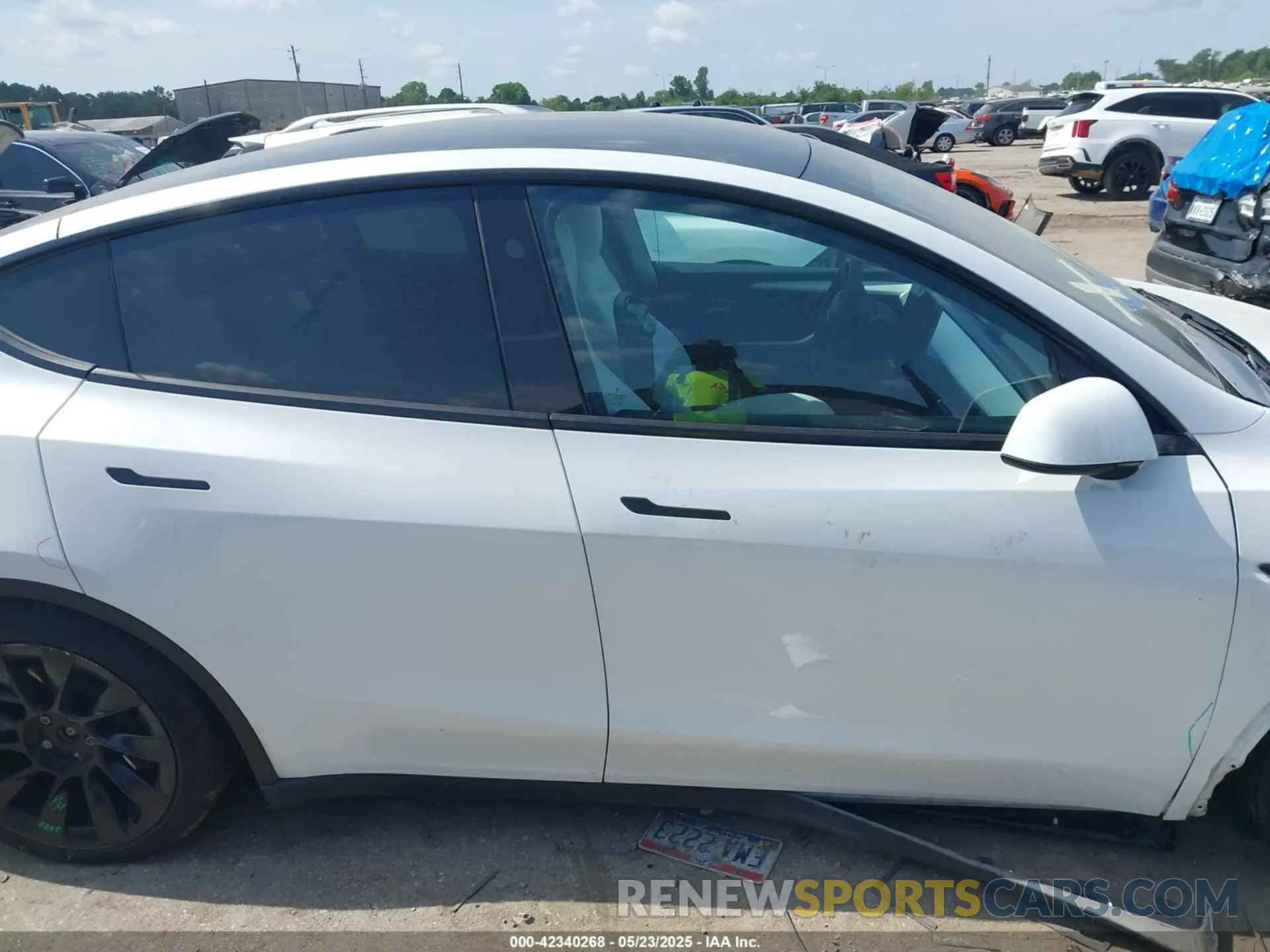 12 Photograph of a damaged car 7SAYGAEE4PF885925 TESLA MODEL Y 2023