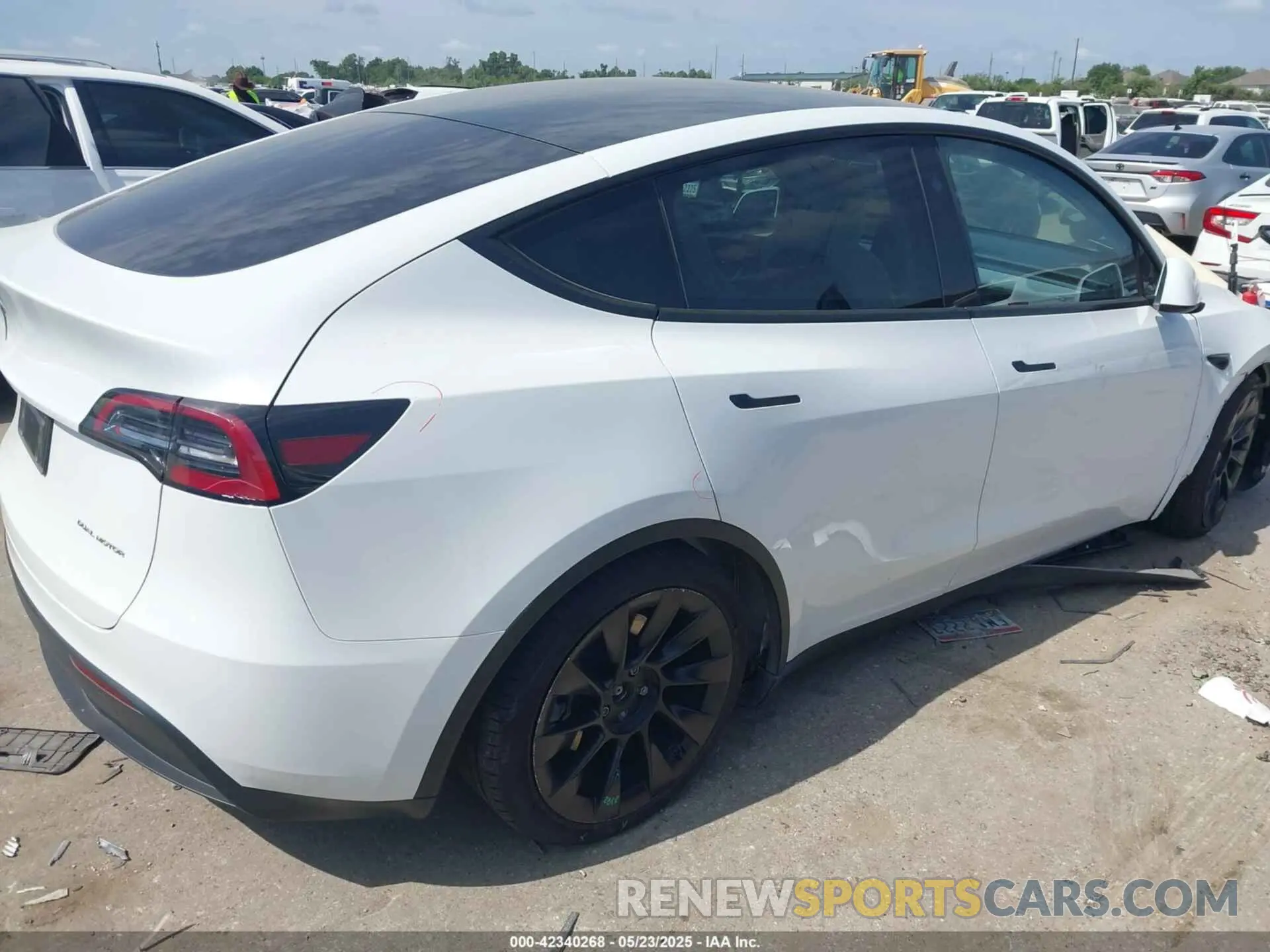 4 Photograph of a damaged car 7SAYGAEE4PF885925 TESLA MODEL Y 2023