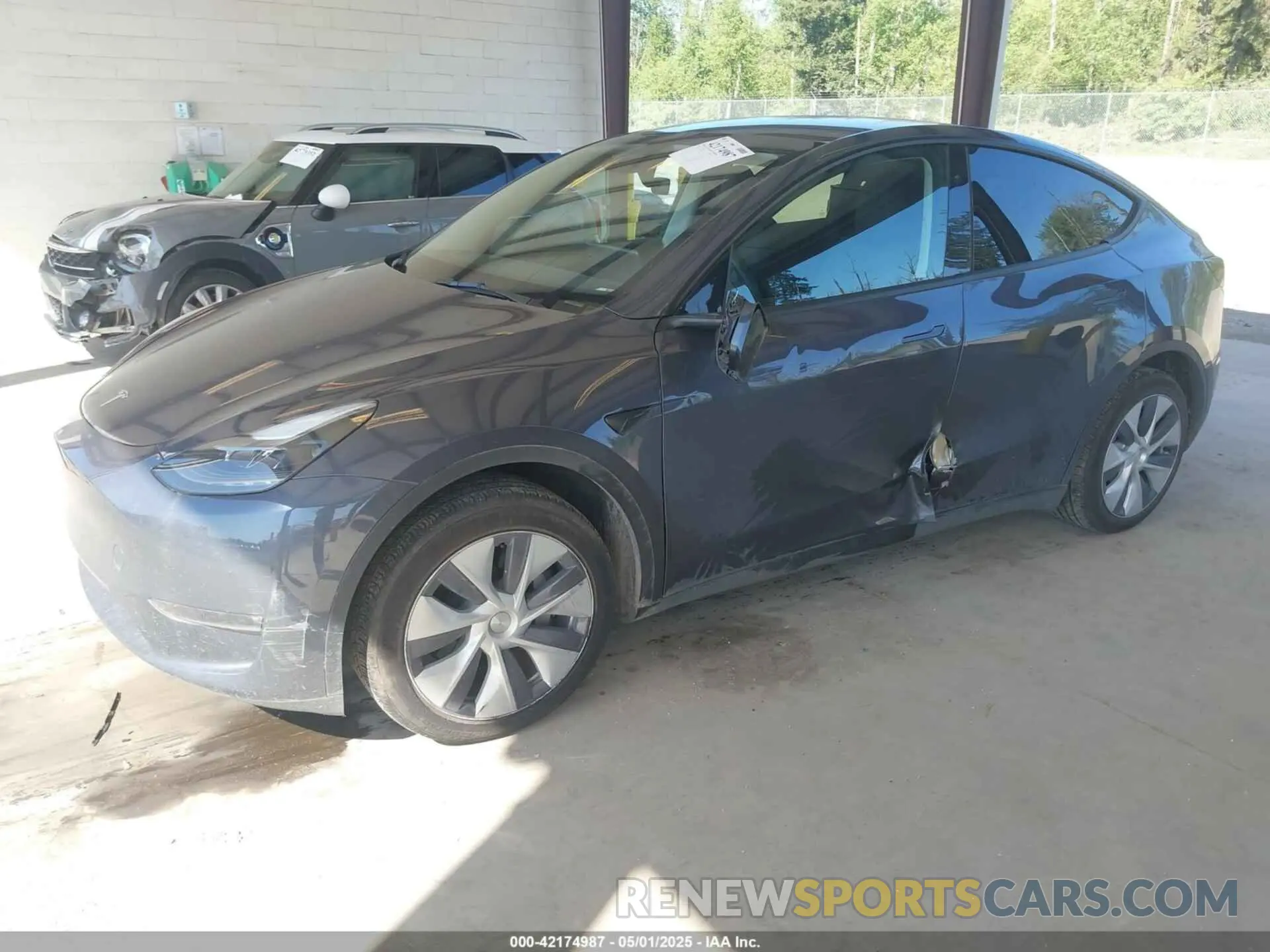 2 Photograph of a damaged car 7SAYGAEE4PF906577 TESLA MODEL Y 2023