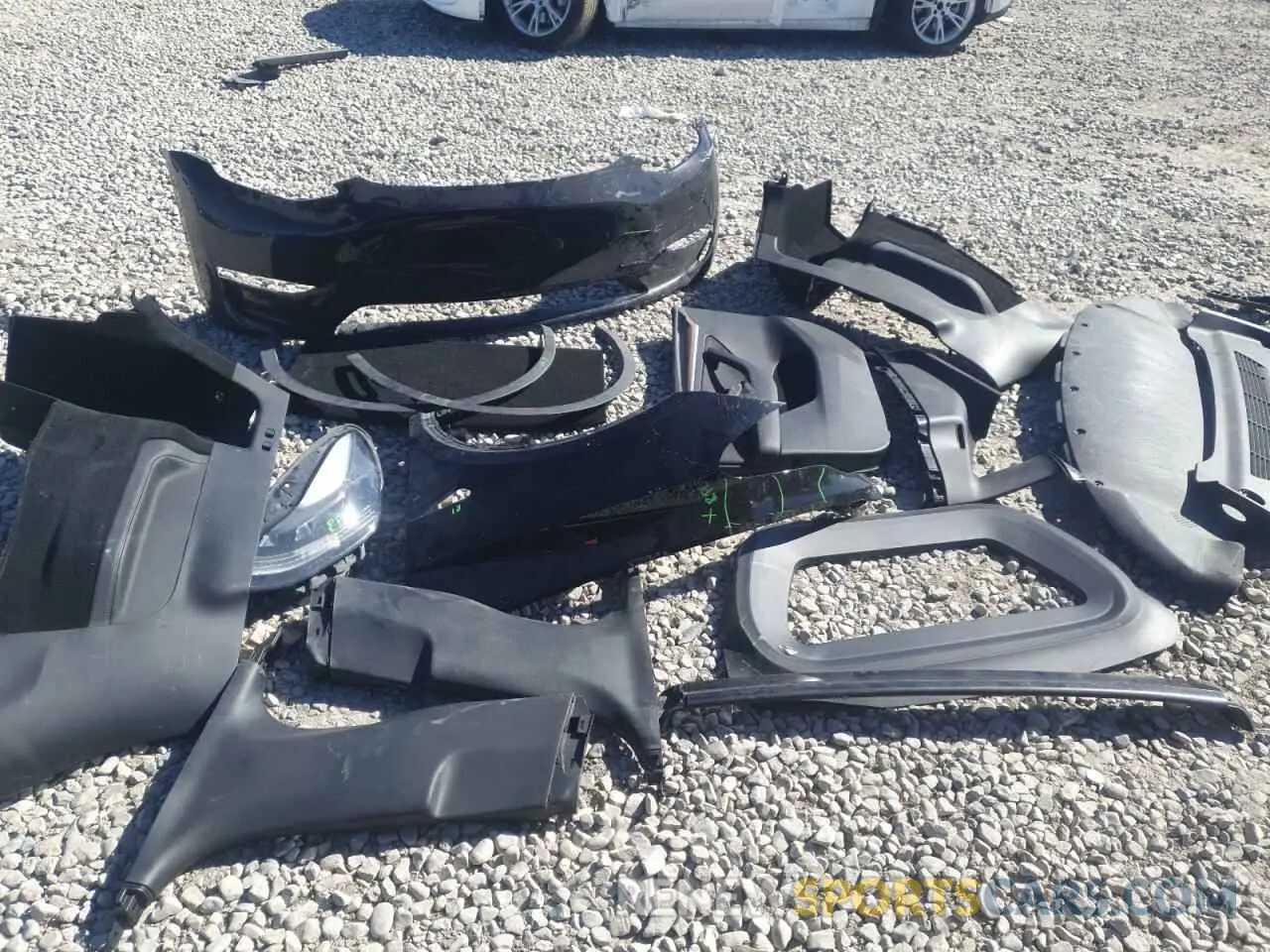 12 Photograph of a damaged car 7SAYGAEE5PF711801 TESLA MODEL Y 2023