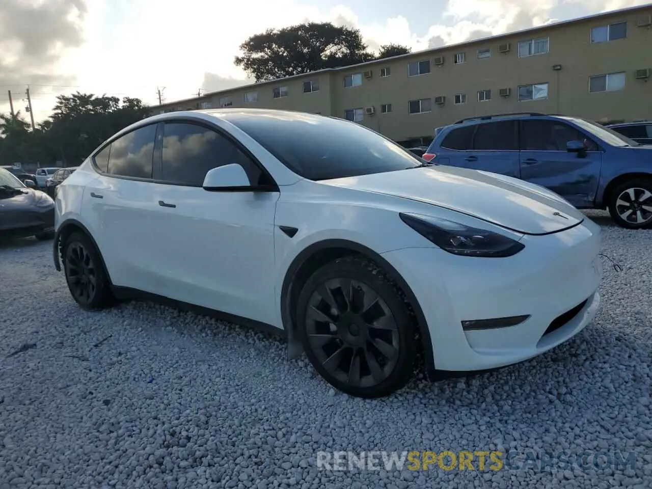4 Photograph of a damaged car 7SAYGAEE5PF809727 TESLA MODEL Y 2023