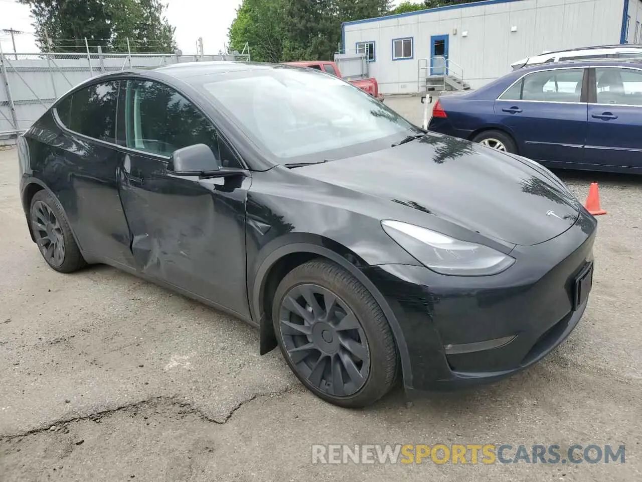 4 Photograph of a damaged car 7SAYGAEE5PF889868 TESLA MODEL Y 2023