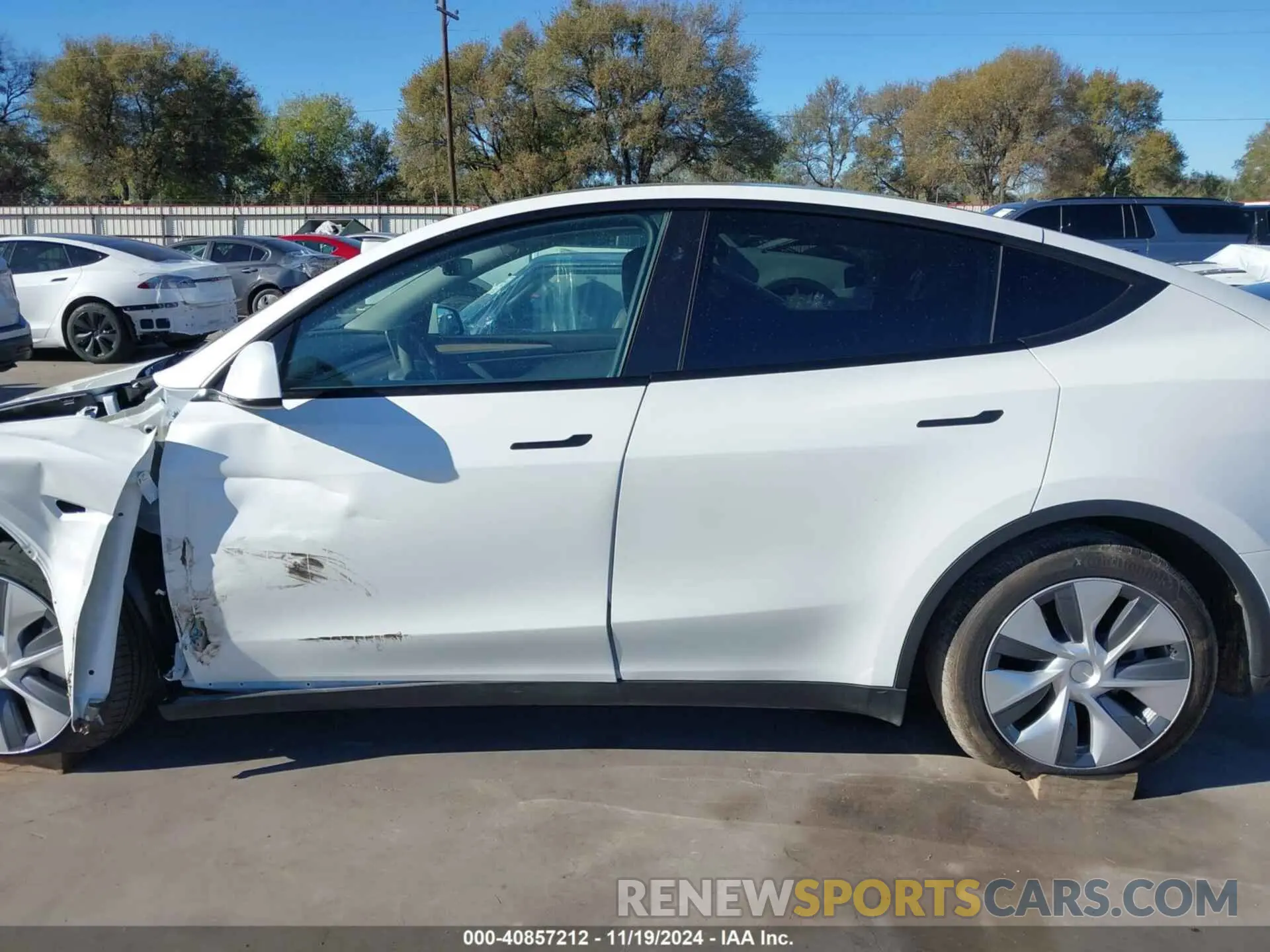 14 Photograph of a damaged car 7SAYGAEE5PF904904 TESLA MODEL Y 2023