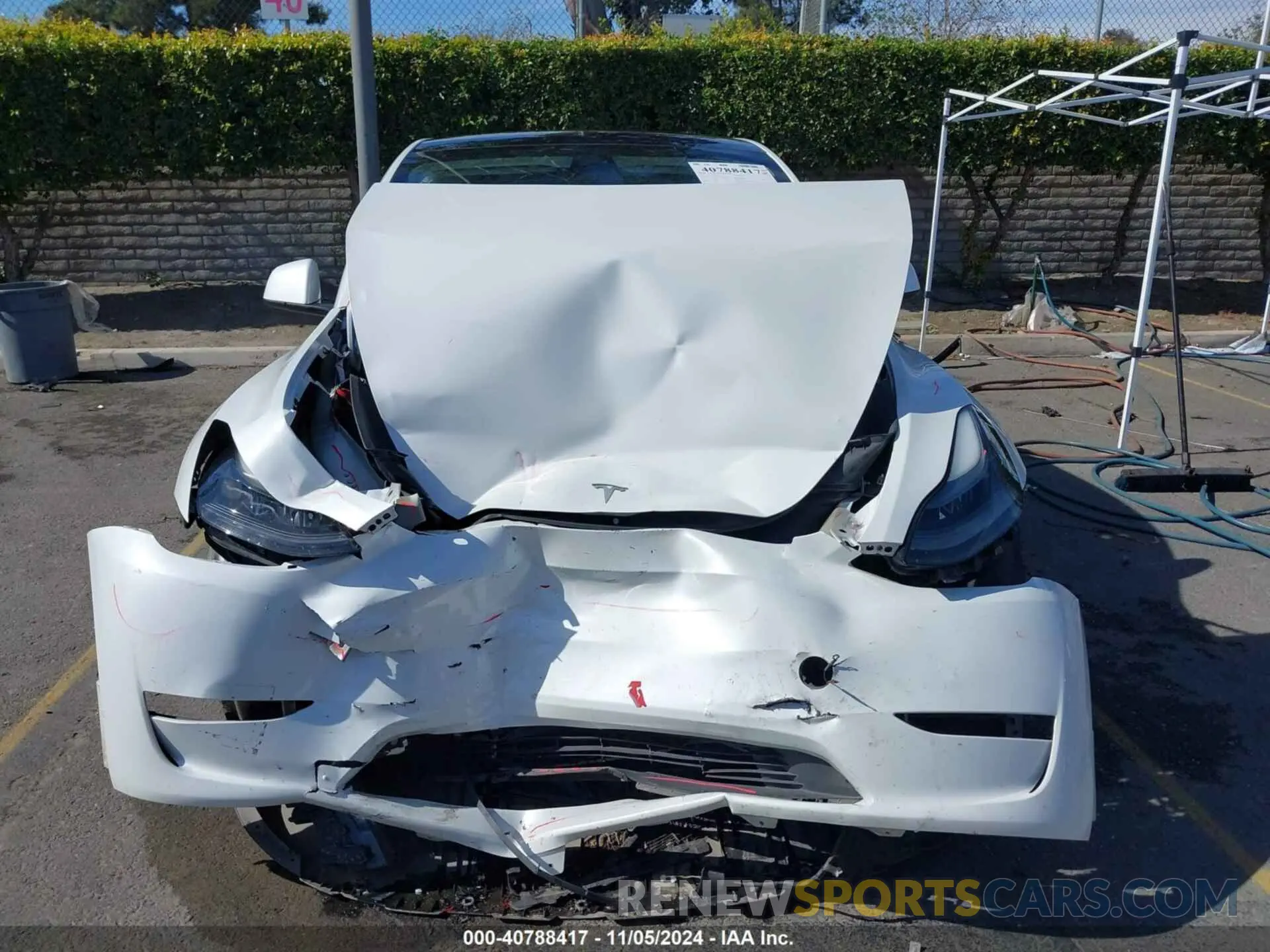 12 Photograph of a damaged car 7SAYGAEE6PF662625 TESLA MODEL Y 2023