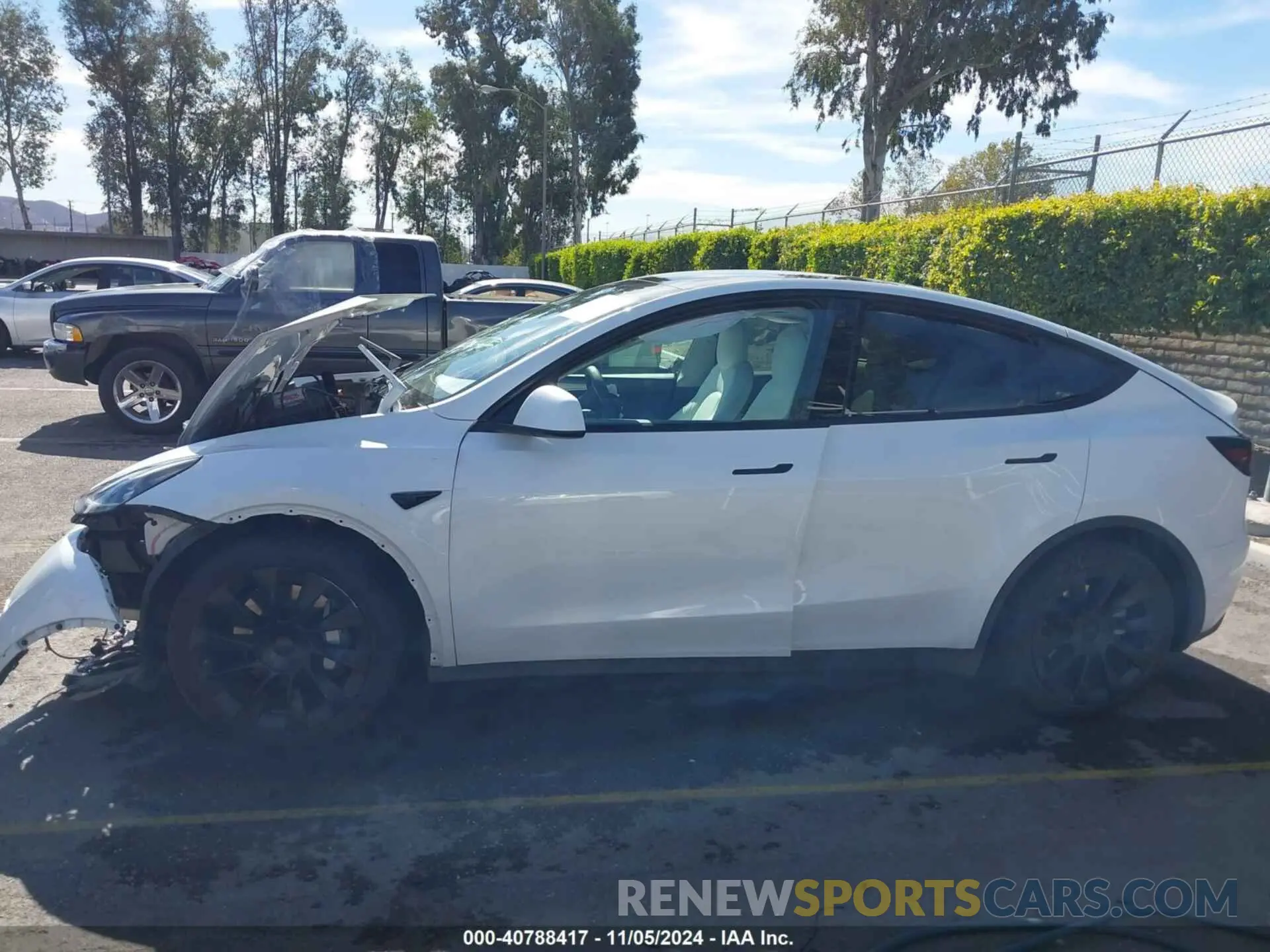 14 Photograph of a damaged car 7SAYGAEE6PF662625 TESLA MODEL Y 2023