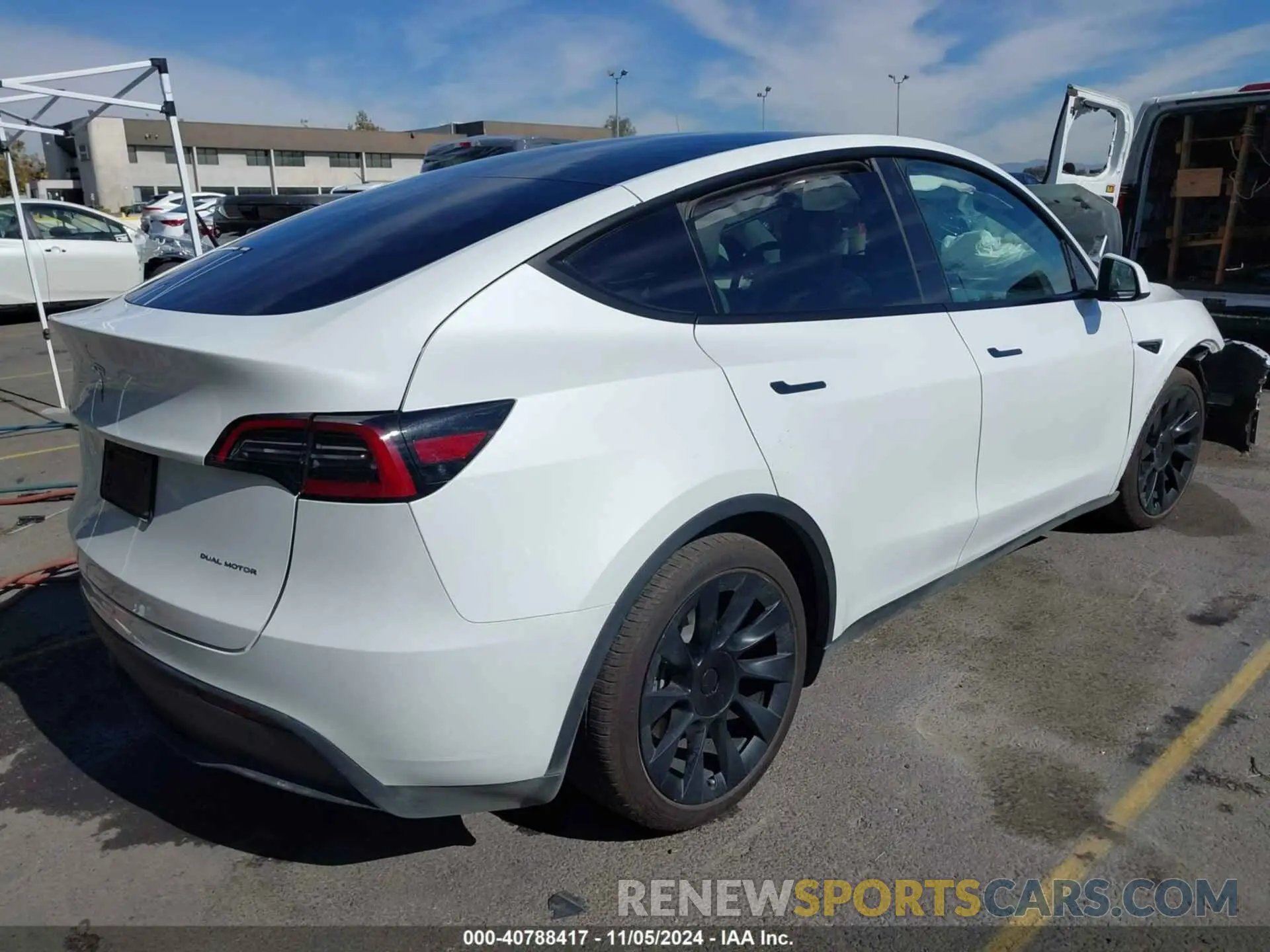 4 Photograph of a damaged car 7SAYGAEE6PF662625 TESLA MODEL Y 2023