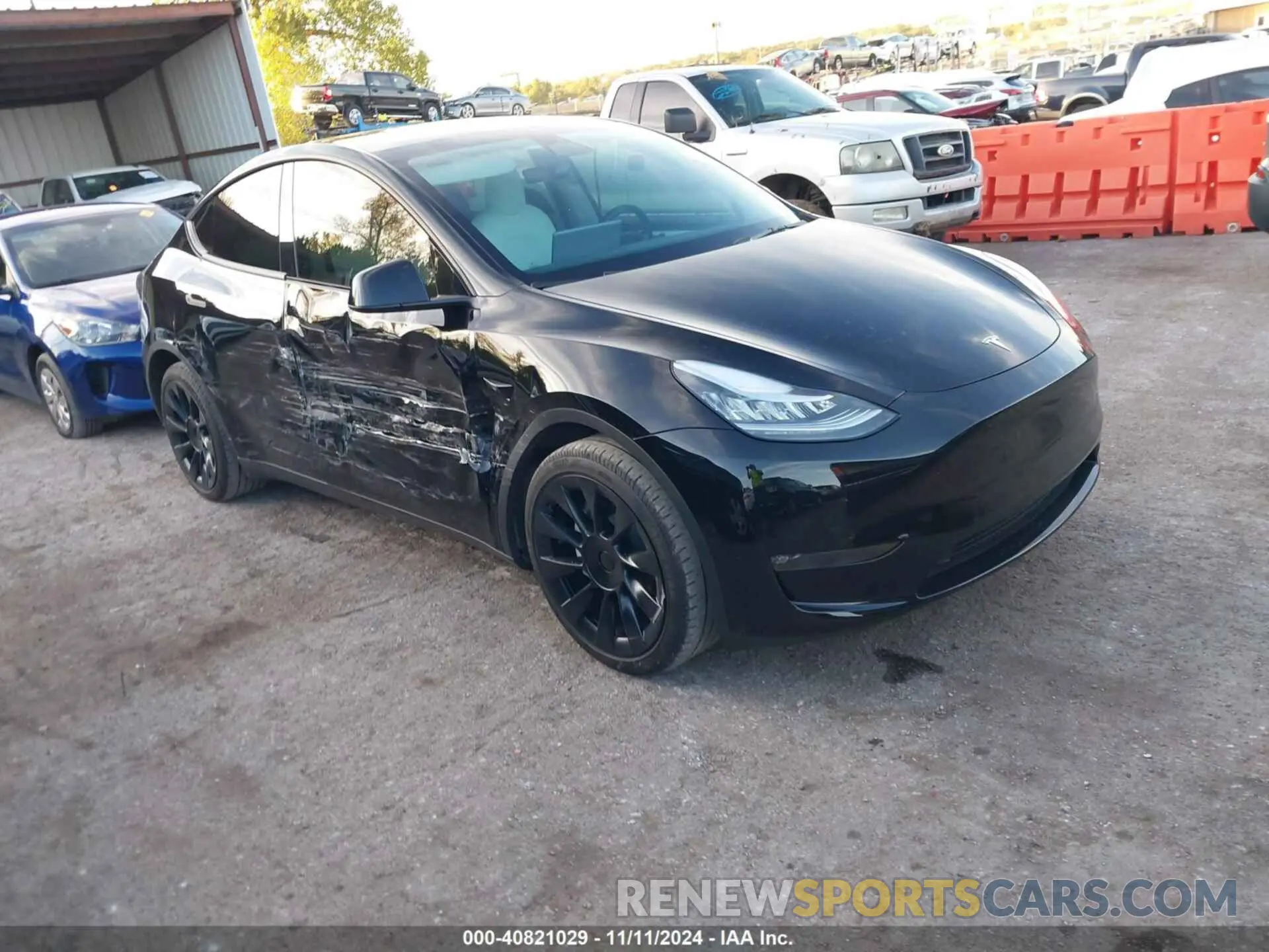 1 Photograph of a damaged car 7SAYGAEE7PF599180 TESLA MODEL Y 2023