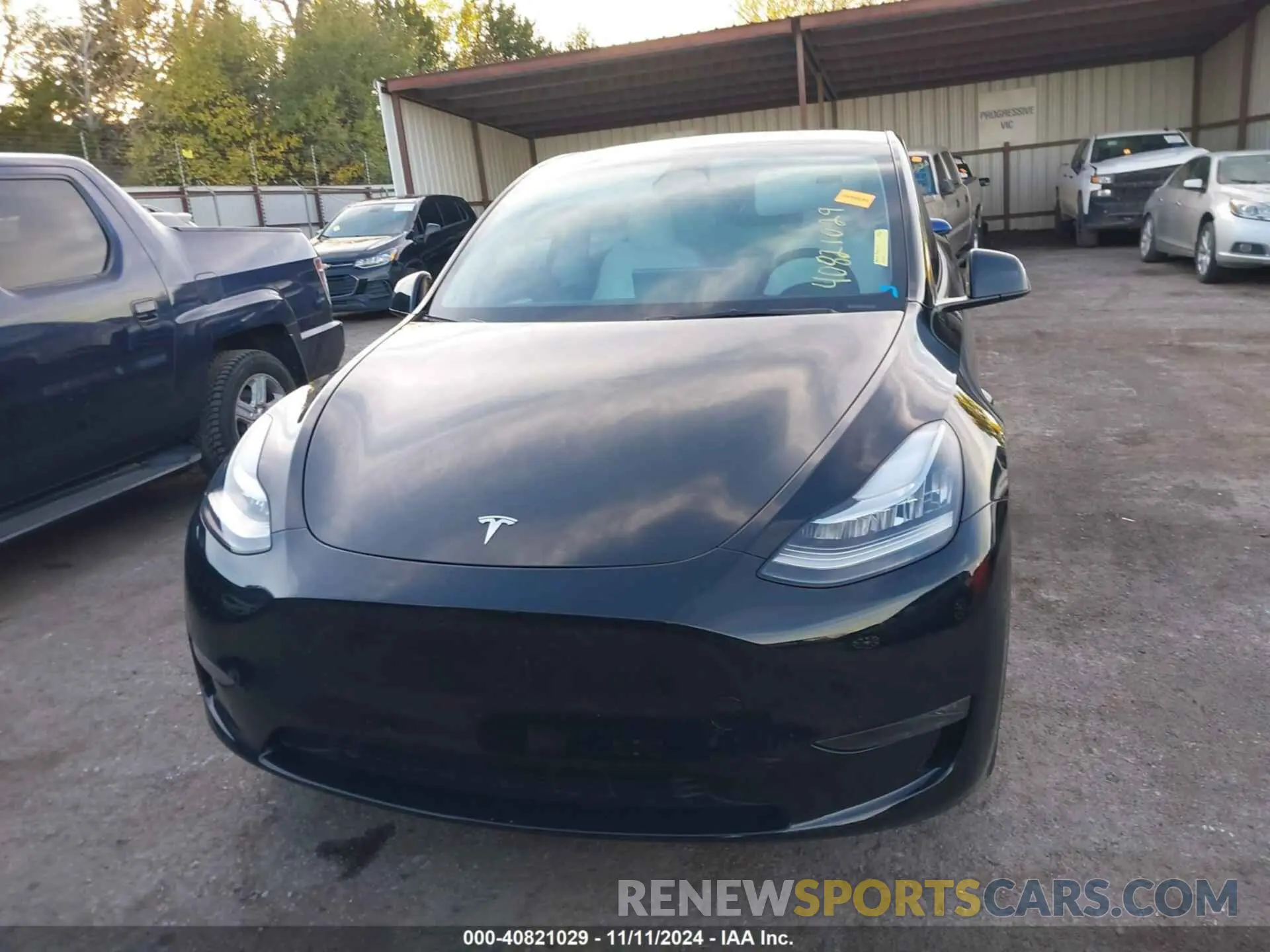 12 Photograph of a damaged car 7SAYGAEE7PF599180 TESLA MODEL Y 2023