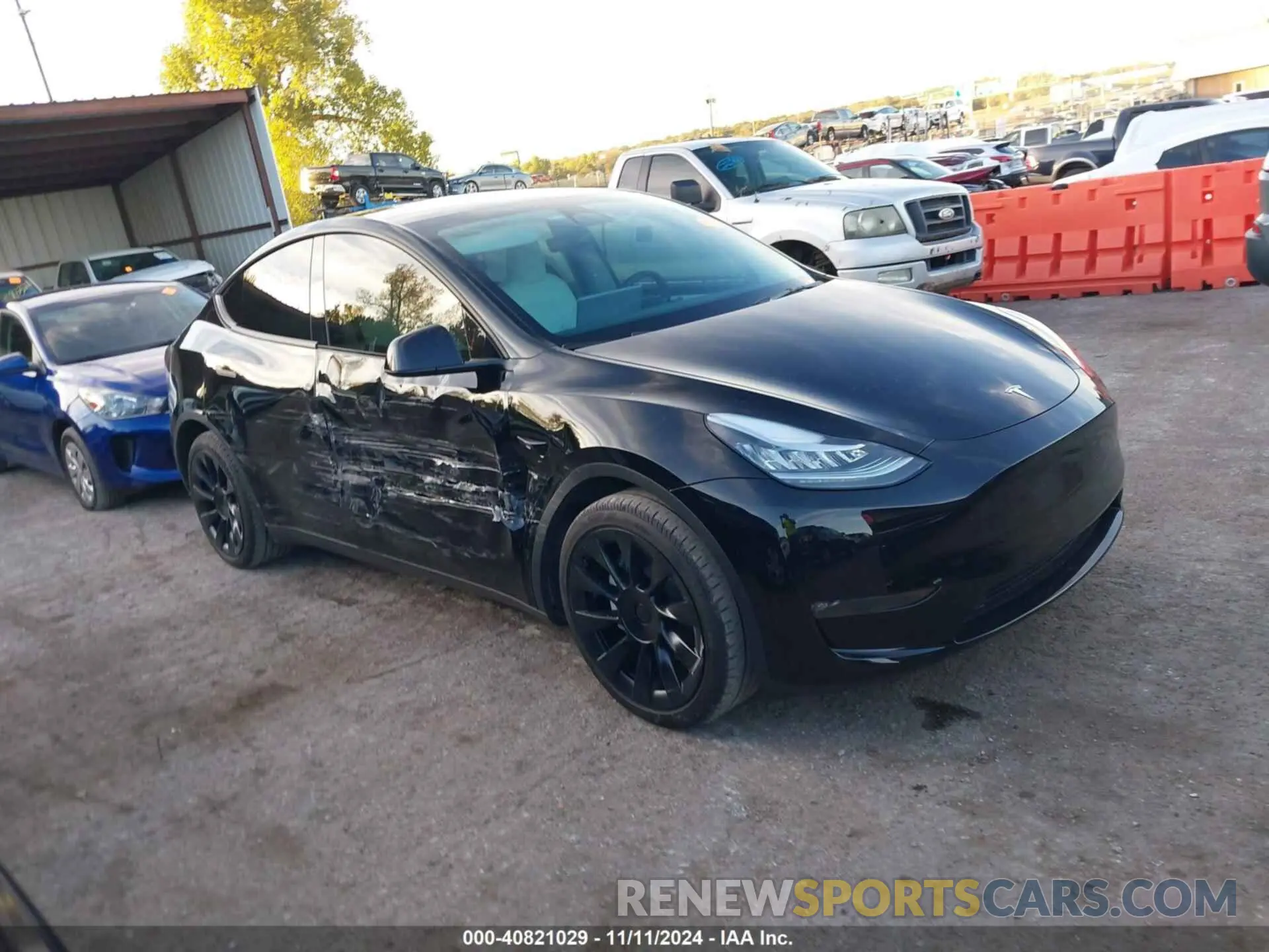 13 Photograph of a damaged car 7SAYGAEE7PF599180 TESLA MODEL Y 2023