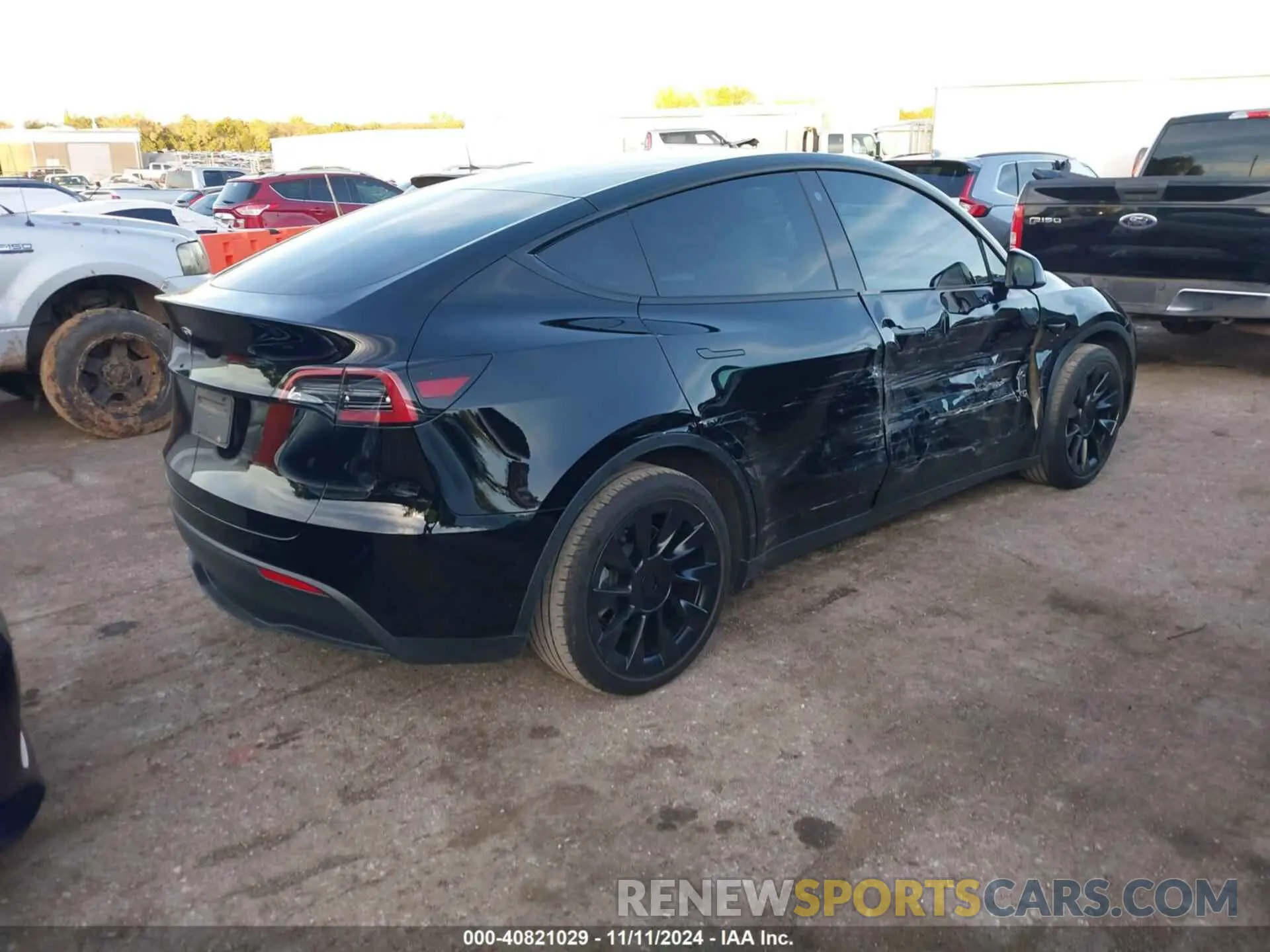 4 Photograph of a damaged car 7SAYGAEE7PF599180 TESLA MODEL Y 2023