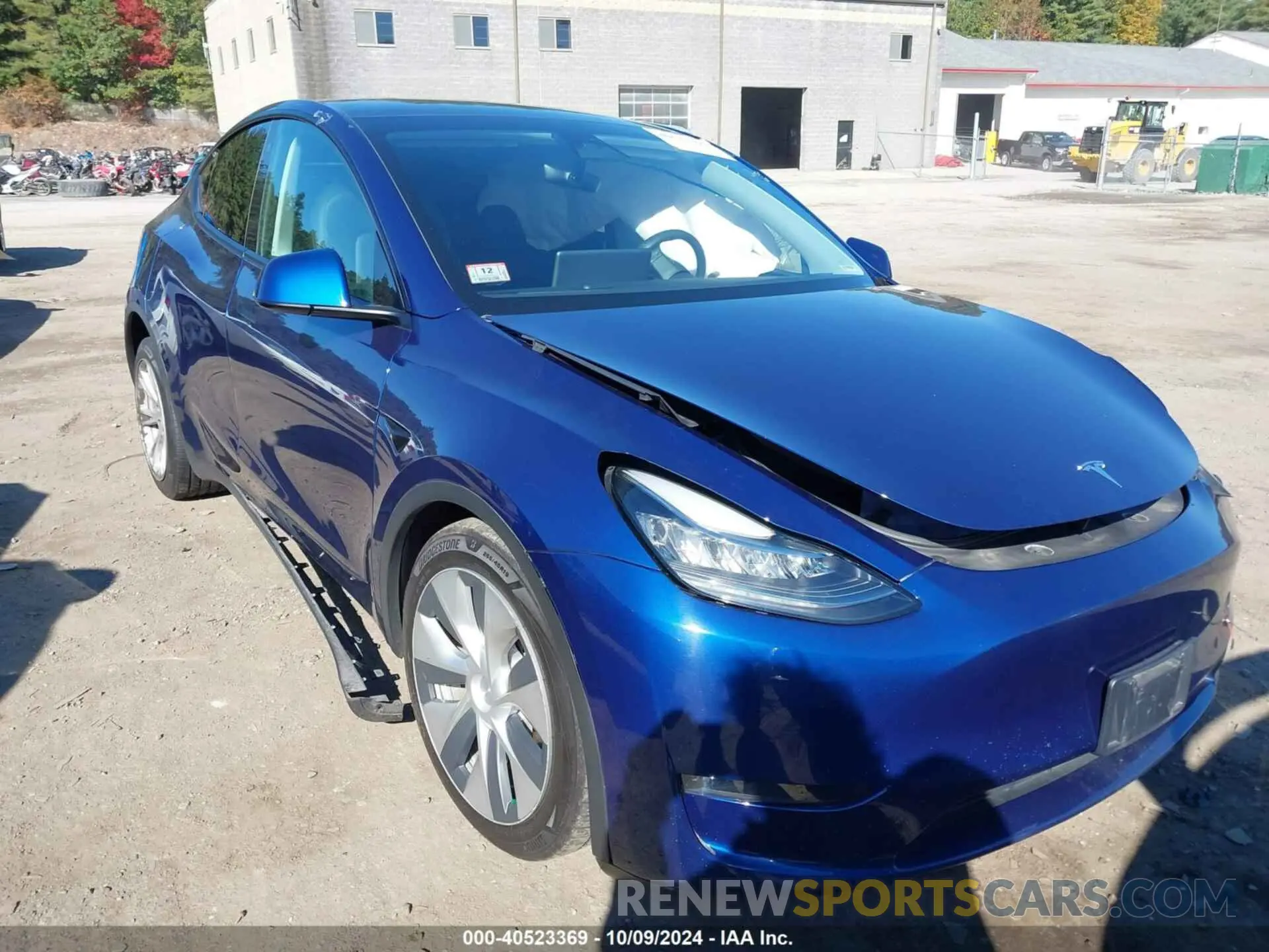12 Photograph of a damaged car 7SAYGAEE7PF611442 TESLA MODEL Y 2023