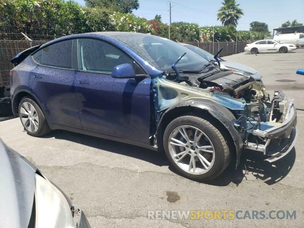 4 Photograph of a damaged car 7SAYGAEE7PF742466 TESLA MODEL Y 2023