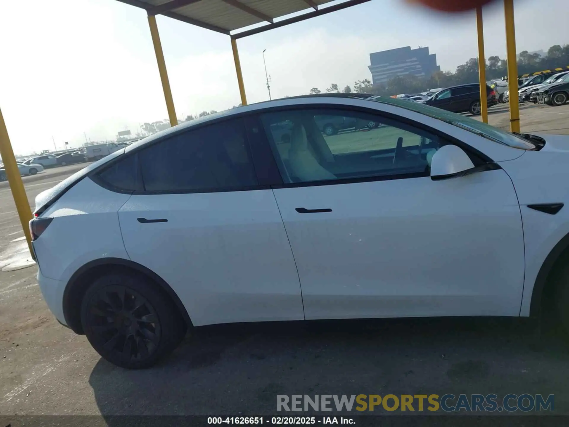 14 Photograph of a damaged car 7SAYGAEE7PF766735 TESLA MODEL Y 2023