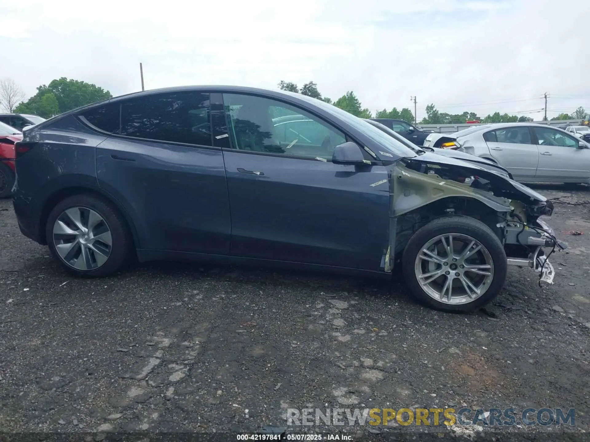 12 Photograph of a damaged car 7SAYGAEE8PF622191 TESLA MODEL Y 2023
