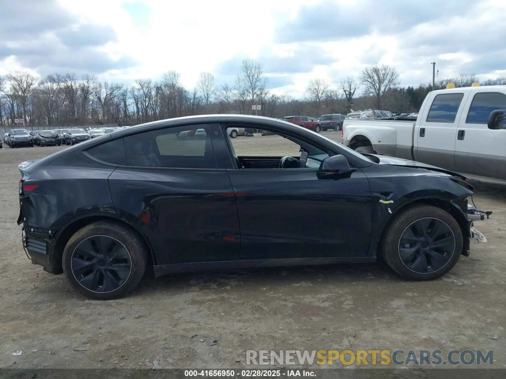 13 Photograph of a damaged car 7SAYGAEE9PF582431 TESLA MODEL Y 2023
