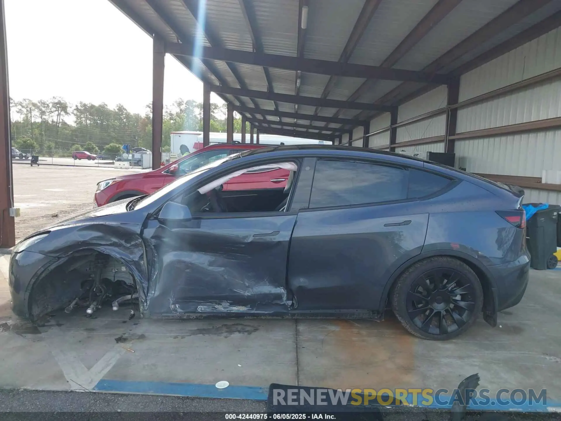 14 Photograph of a damaged car 7SAYGAEE9PF621681 TESLA MODEL Y 2023