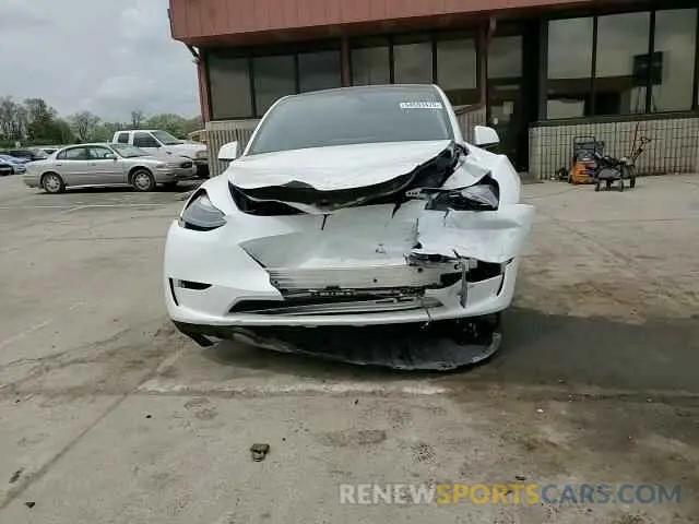 15 Photograph of a damaged car 7SAYGAEE9PF686434 TESLA MODEL Y 2023