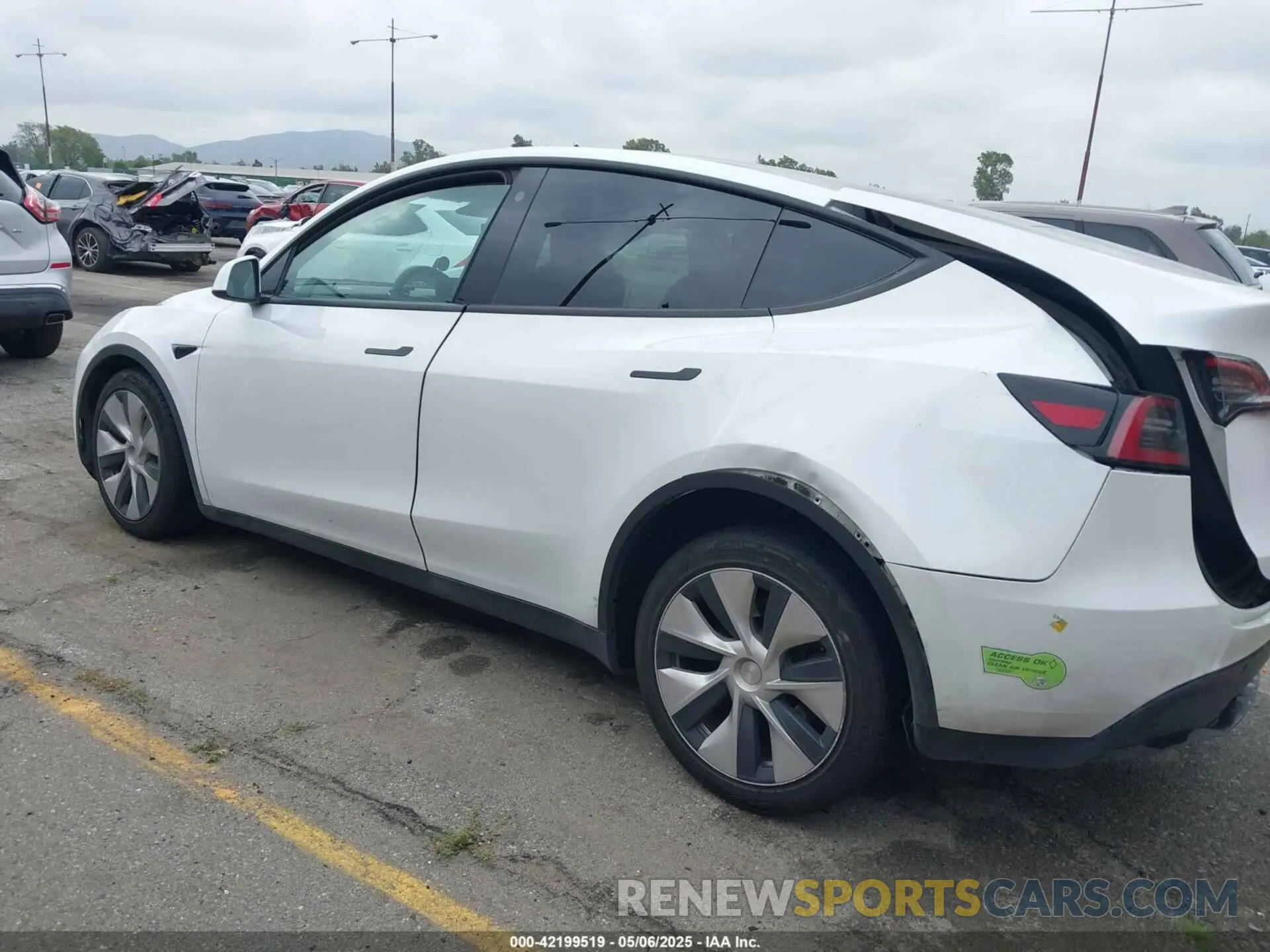 14 Photograph of a damaged car 7SAYGAEE9PF702910 TESLA MODEL Y 2023