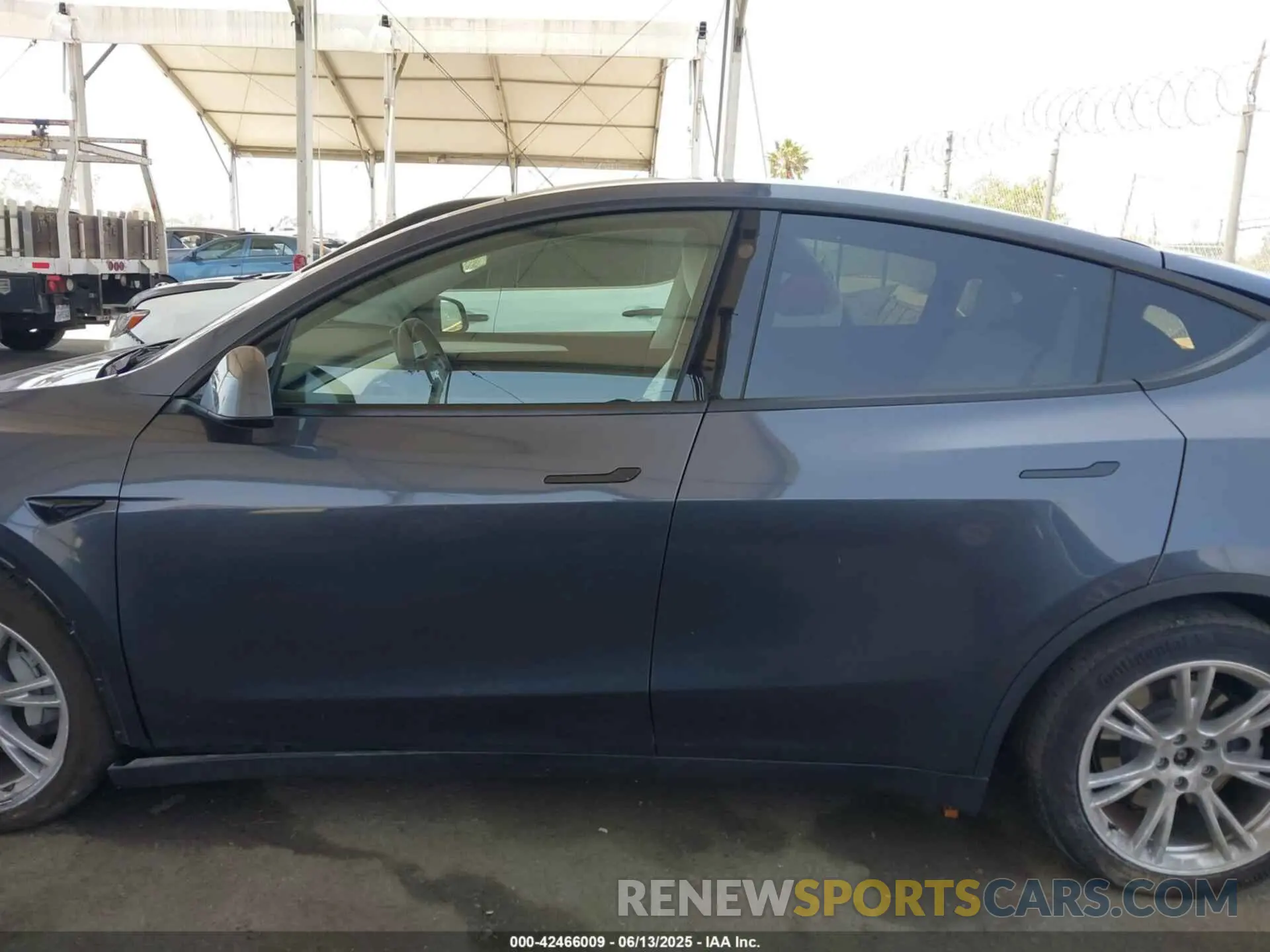 14 Photograph of a damaged car 7SAYGAEE9PF743795 TESLA MODEL Y 2023