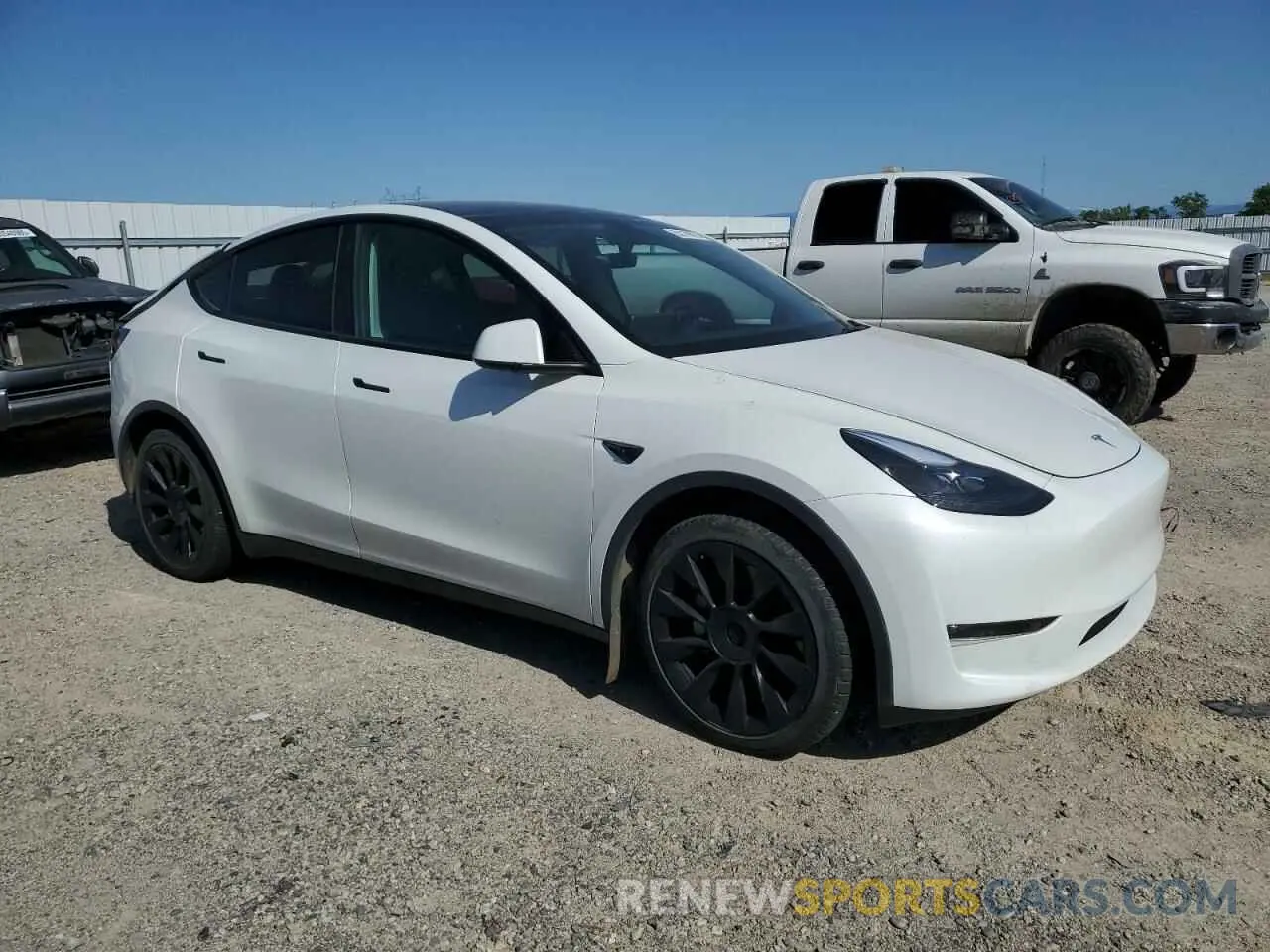 4 Photograph of a damaged car 7SAYGAEEXPF594572 TESLA MODEL Y 2023