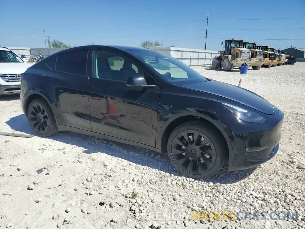 4 Photograph of a damaged car 7SAYGAEEXPF709736 TESLA MODEL Y 2023
