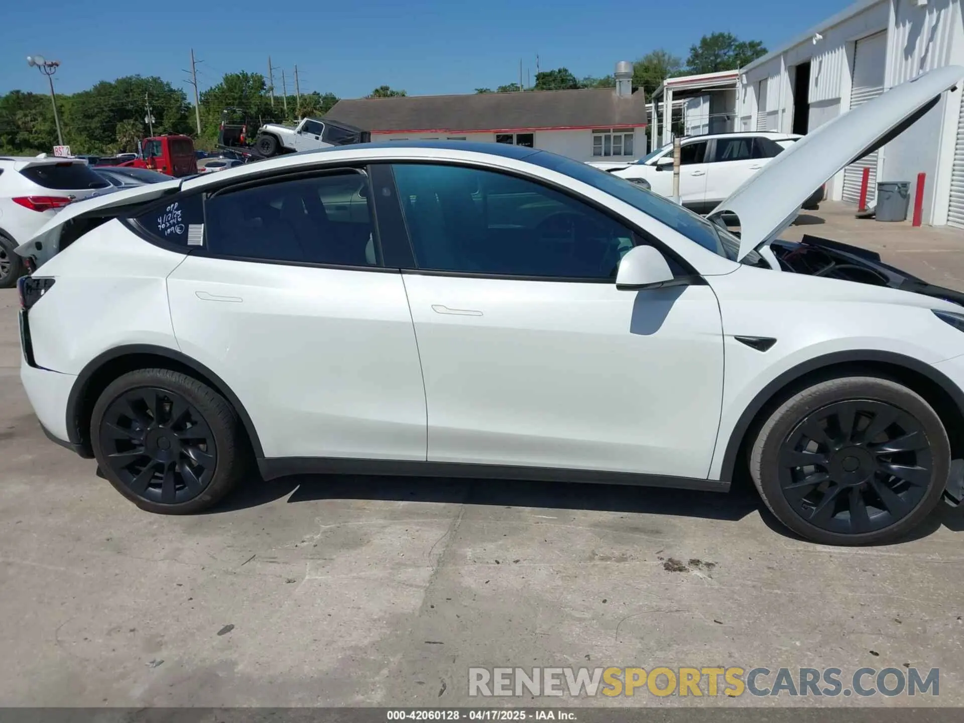 14 Photograph of a damaged car 7SAYGAEEXPF800974 TESLA MODEL Y 2023
