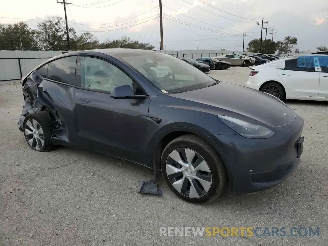 4 Photograph of a damaged car 7SAYGAEEXPF882902 TESLA MODEL Y 2023