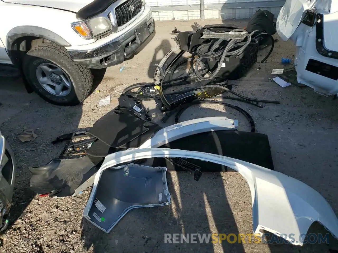 12 Photograph of a damaged car 7SAYGAEEXPF922668 TESLA MODEL Y 2023