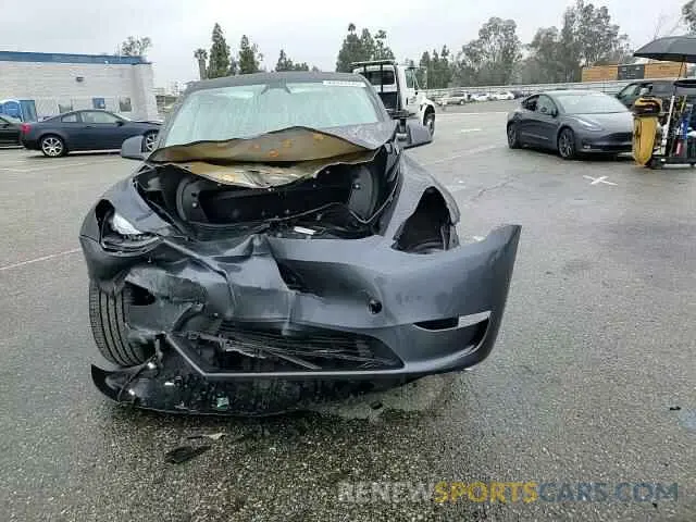 11 Photograph of a damaged car 7SAYGDED0PF977817 TESLA MODEL Y 2023