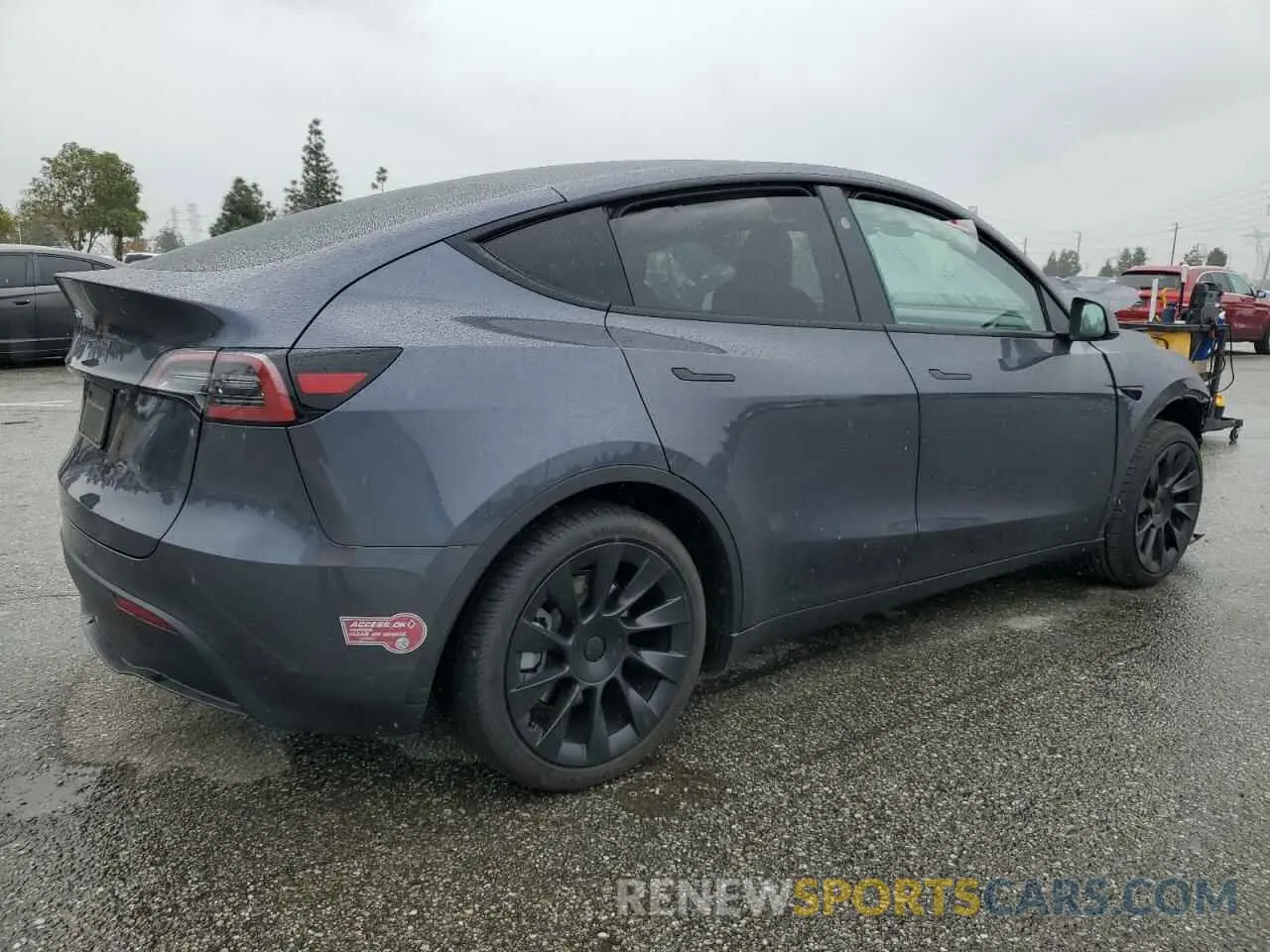 3 Photograph of a damaged car 7SAYGDED0PF977817 TESLA MODEL Y 2023