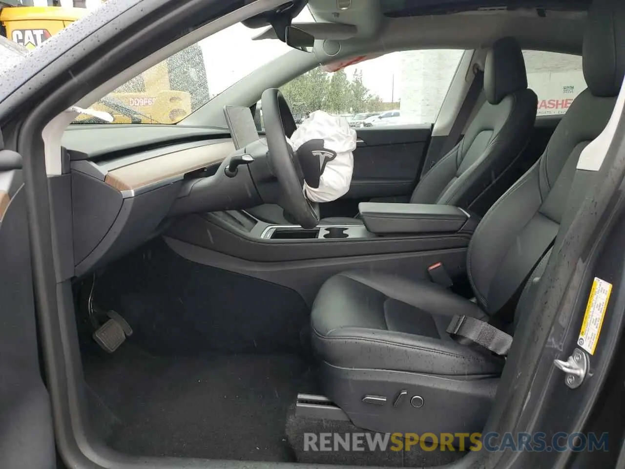 7 Photograph of a damaged car 7SAYGDED0PF977817 TESLA MODEL Y 2023