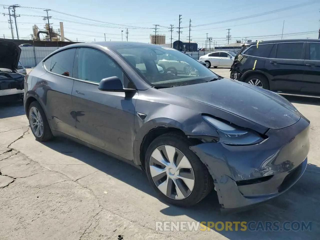 4 Photograph of a damaged car 7SAYGDED1PF934944 TESLA MODEL Y 2023