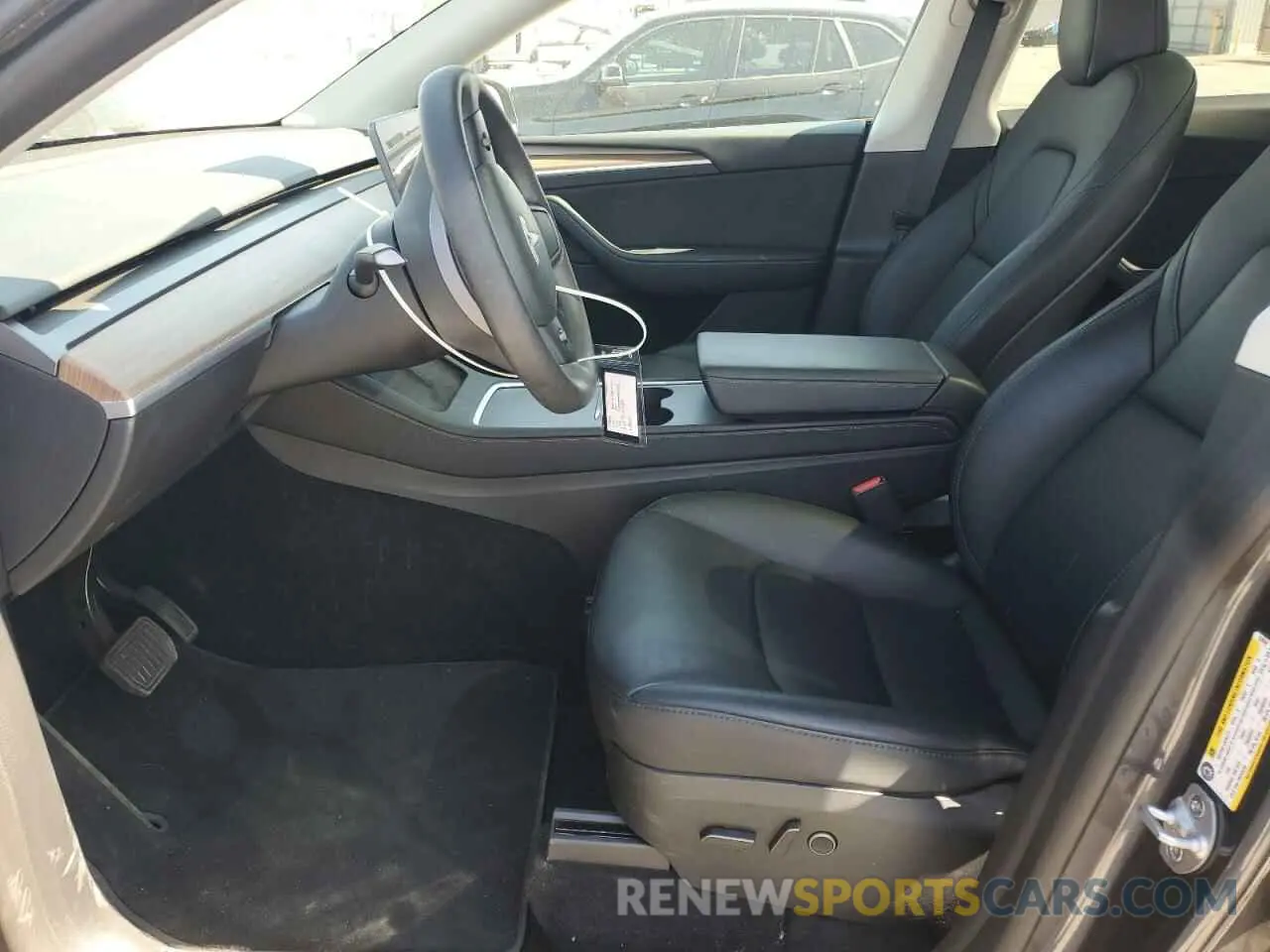 7 Photograph of a damaged car 7SAYGDED1PF934944 TESLA MODEL Y 2023