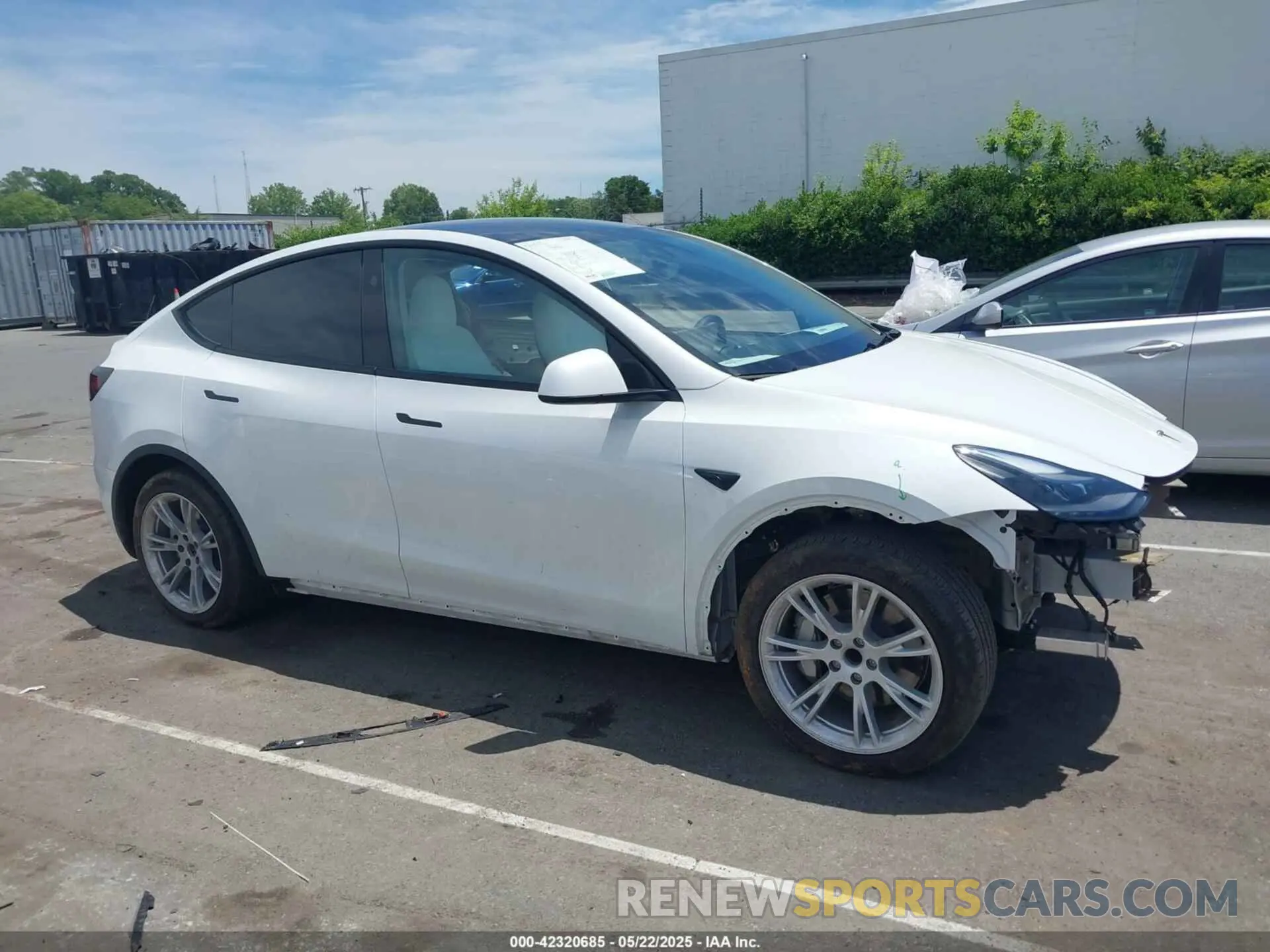 12 Photograph of a damaged car 7SAYGDED2PF931521 TESLA MODEL Y 2023