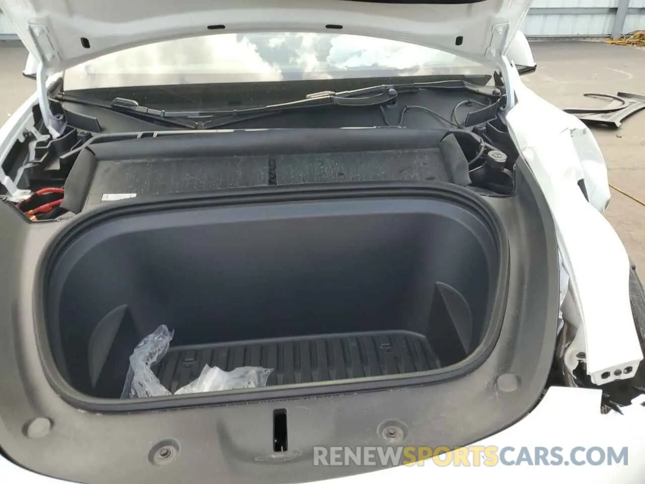 12 Photograph of a damaged car 7SAYGDED2PF946021 TESLA MODEL Y 2023