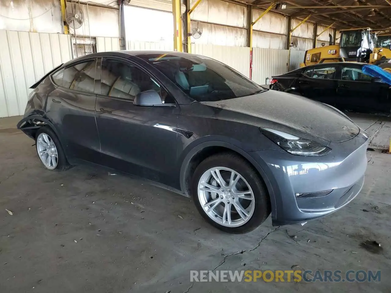 4 Photograph of a damaged car 7SAYGDED3PF971865 TESLA MODEL Y 2023