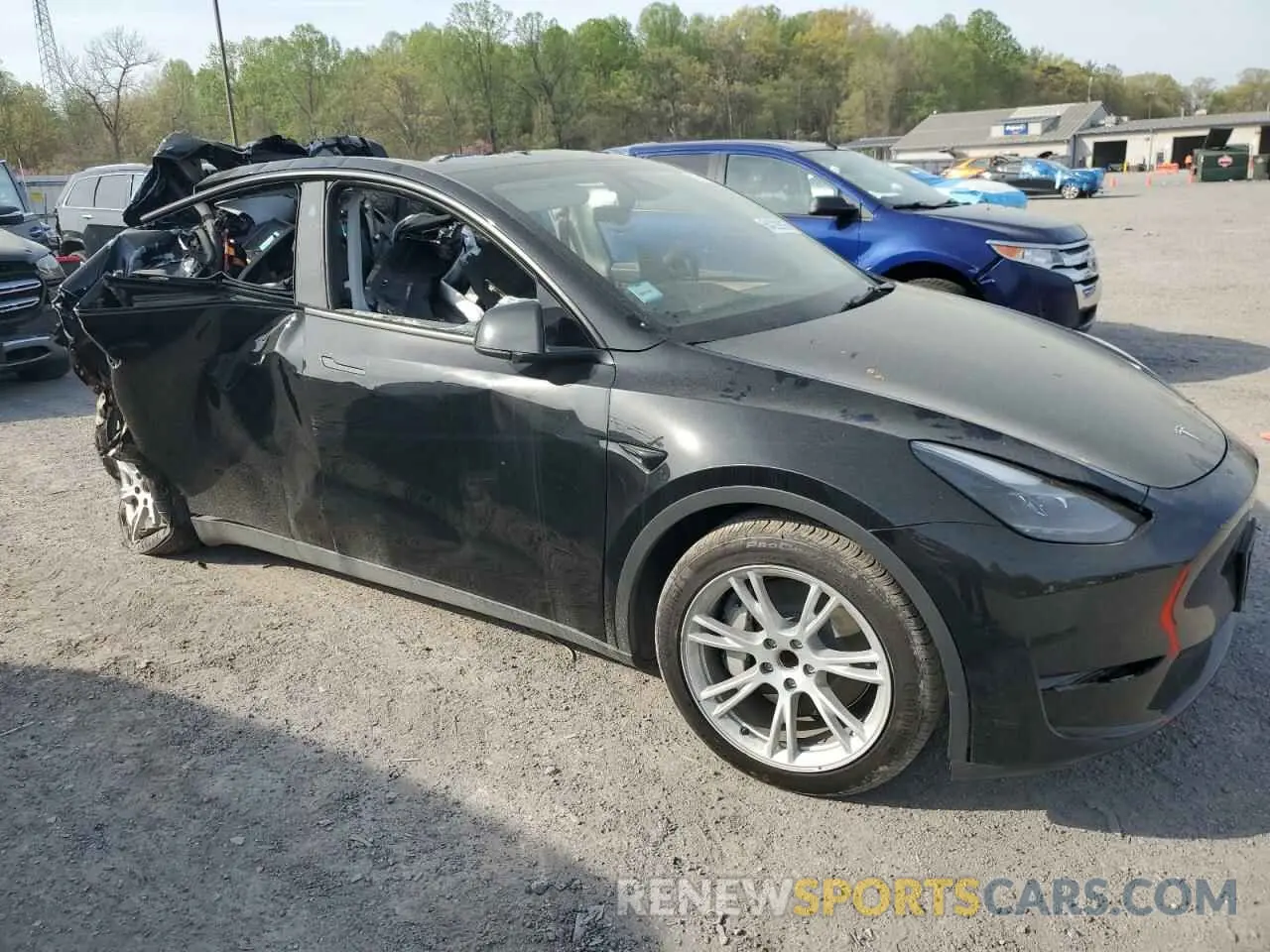 4 Photograph of a damaged car 7SAYGDED4PF931181 TESLA MODEL Y 2023