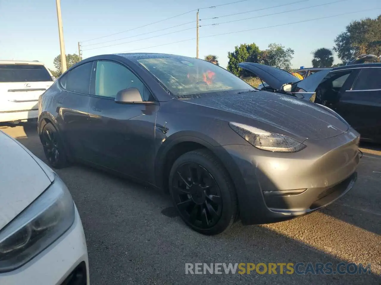 4 Photograph of a damaged car 7SAYGDED4PF949129 TESLA MODEL Y 2023