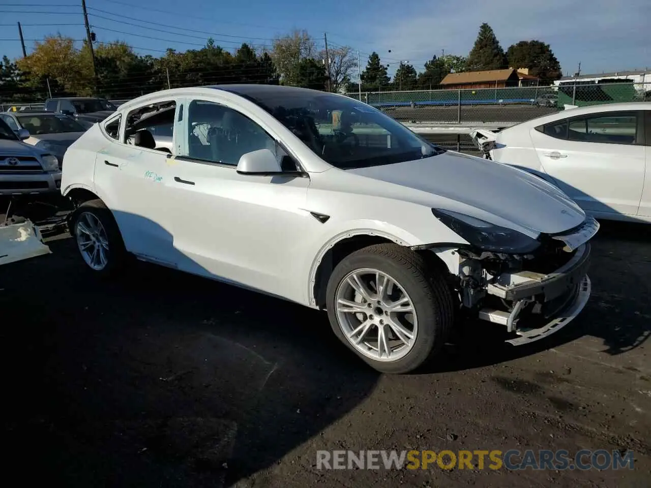 4 Photograph of a damaged car 7SAYGDED4PF960499 TESLA MODEL Y 2023