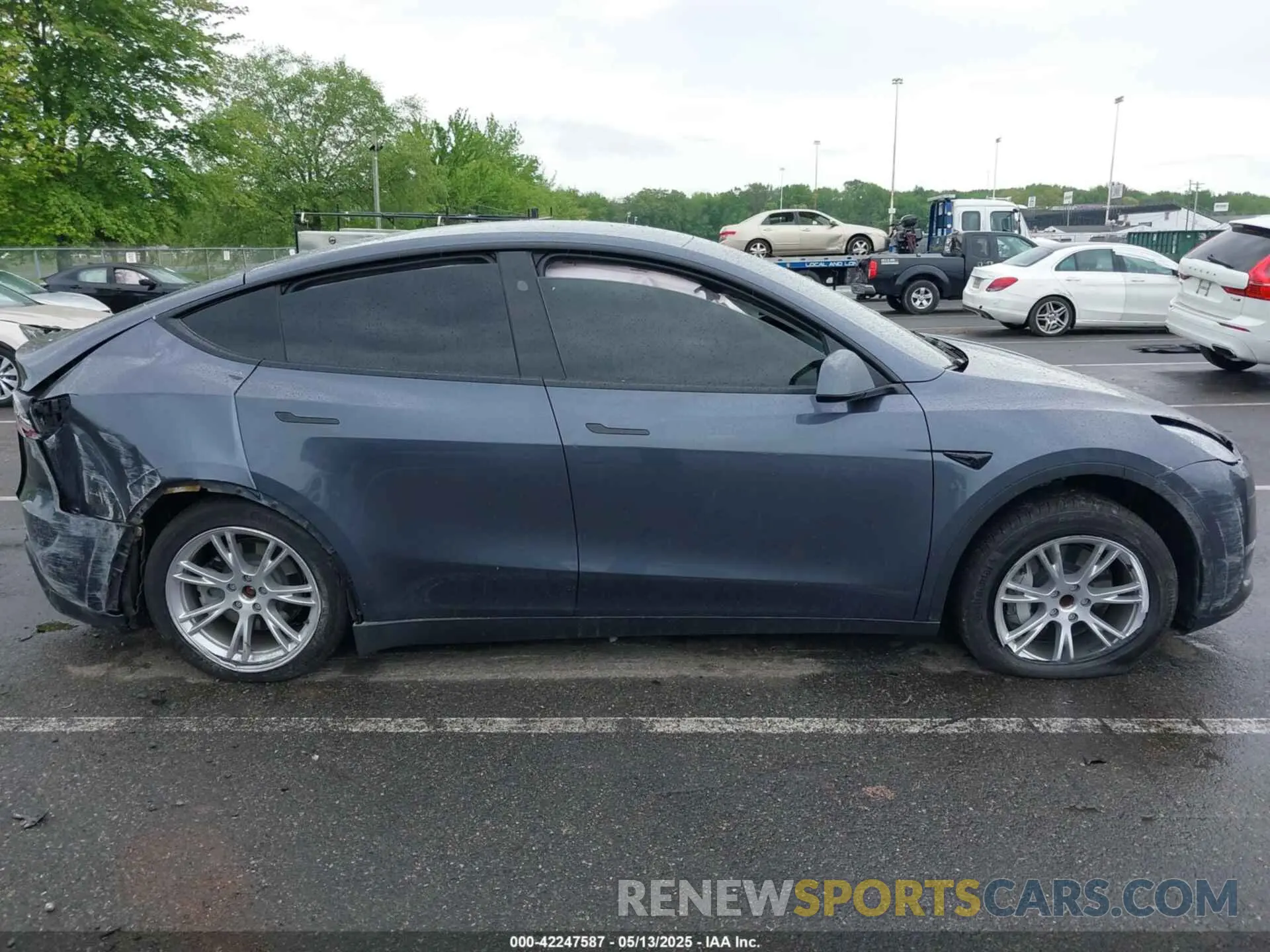 12 Photograph of a damaged car 7SAYGDED5PF958065 TESLA MODEL Y 2023