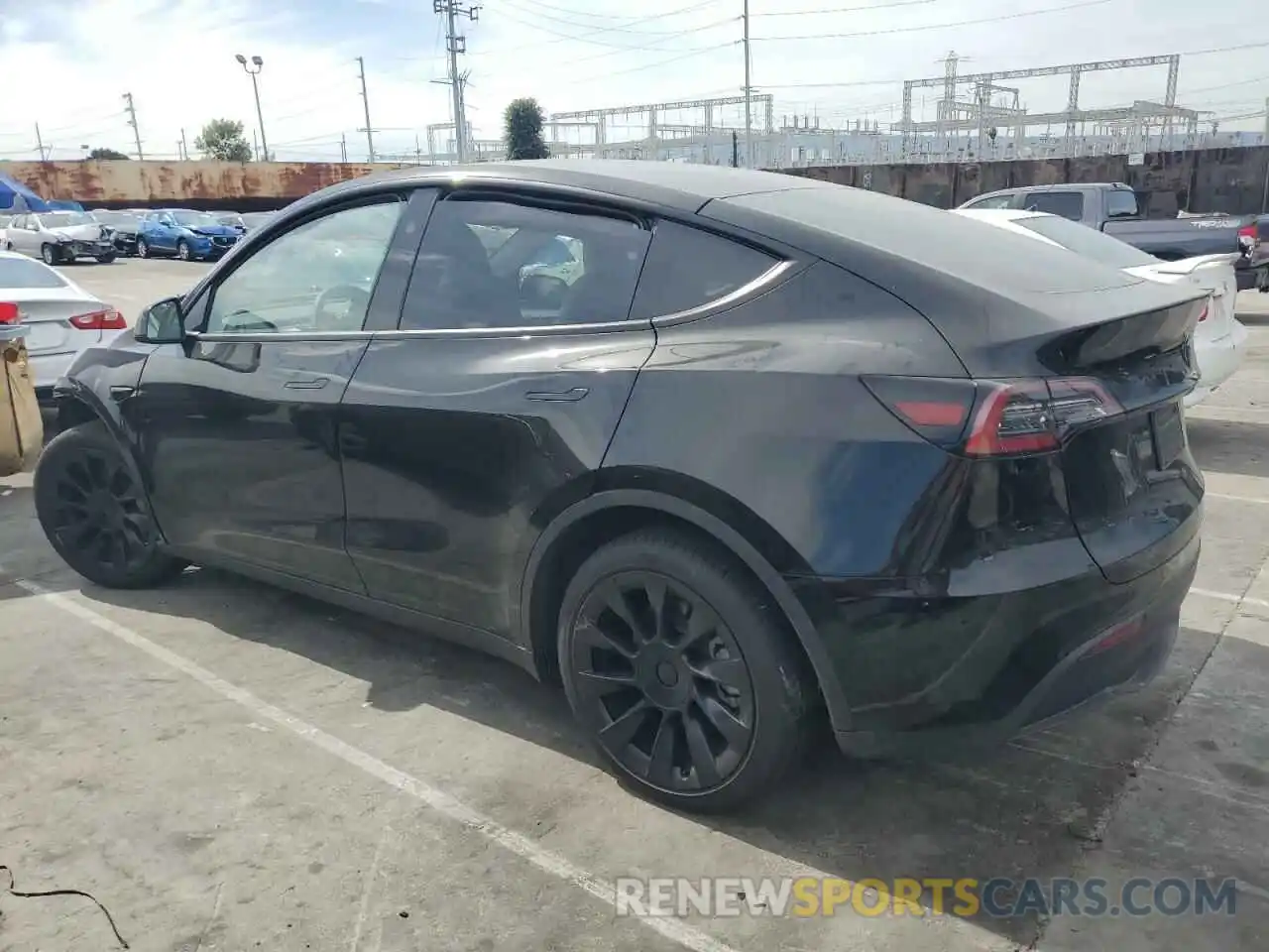 2 Photograph of a damaged car 7SAYGDED6PF931537 TESLA MODEL Y 2023