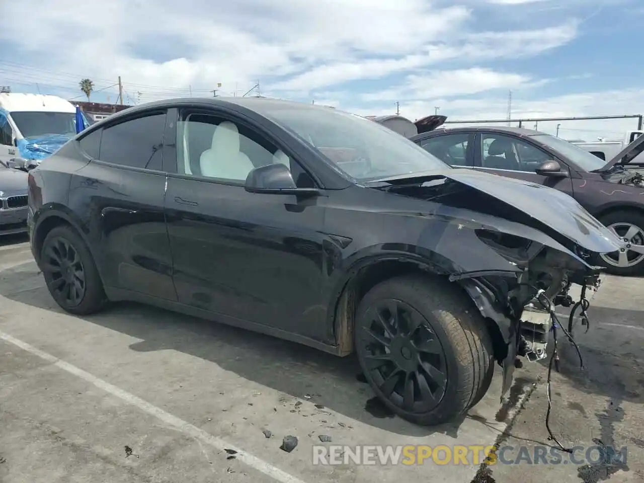 4 Photograph of a damaged car 7SAYGDED6PF931537 TESLA MODEL Y 2023