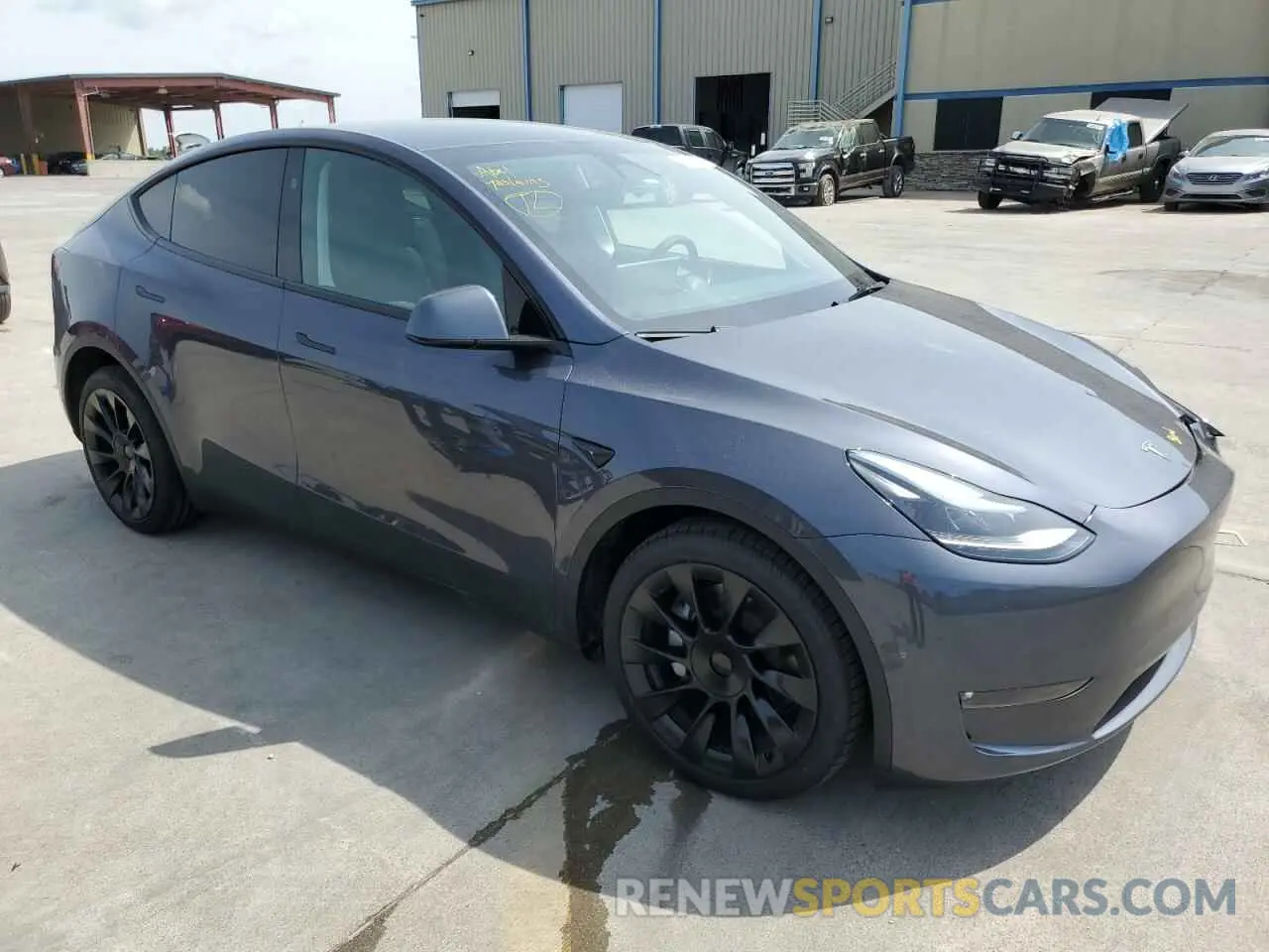 4 Photograph of a damaged car 7SAYGDED7PF950193 TESLA MODEL Y 2023
