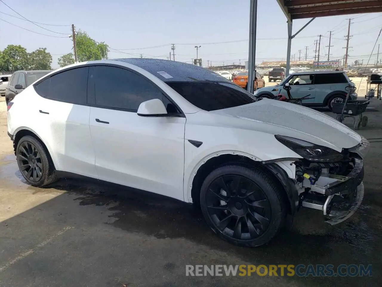 4 Photograph of a damaged car 7SAYGDED7PF964756 TESLA MODEL Y 2023