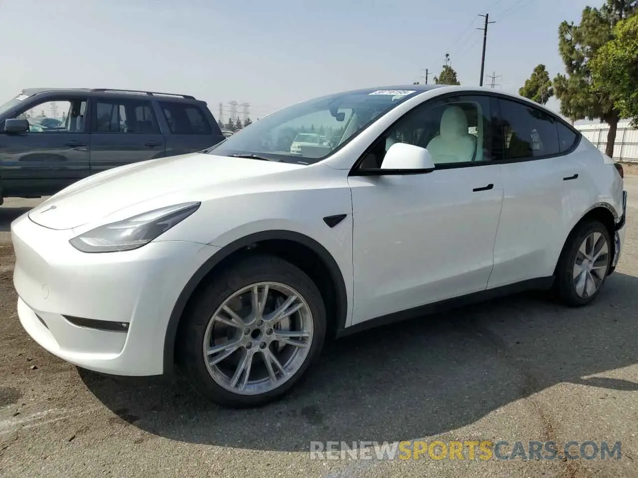 1 Photograph of a damaged car 7SAYGDED8PF933497 TESLA MODEL Y 2023