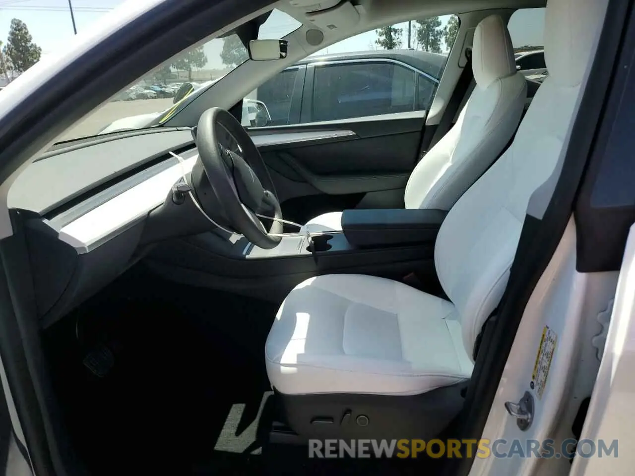 7 Photograph of a damaged car 7SAYGDED8PF933497 TESLA MODEL Y 2023