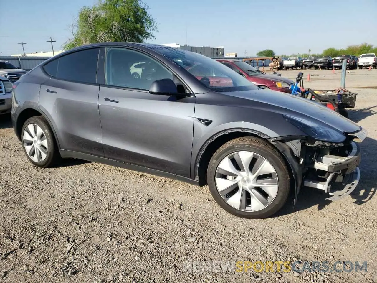 4 Photograph of a damaged car 7SAYGDED8PF958836 TESLA MODEL Y 2023