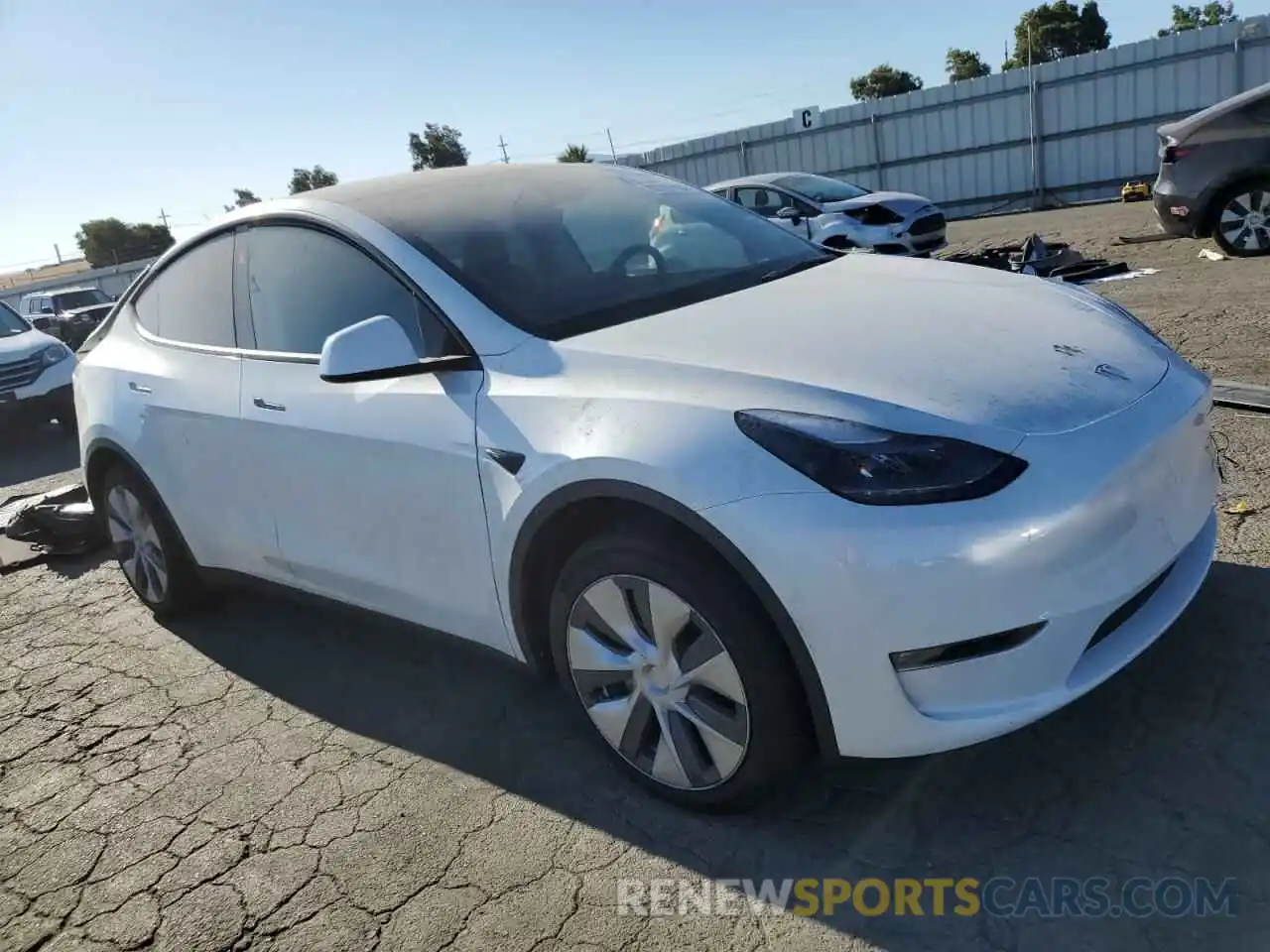 4 Photograph of a damaged car 7SAYGDED8PF959565 TESLA MODEL Y 2023